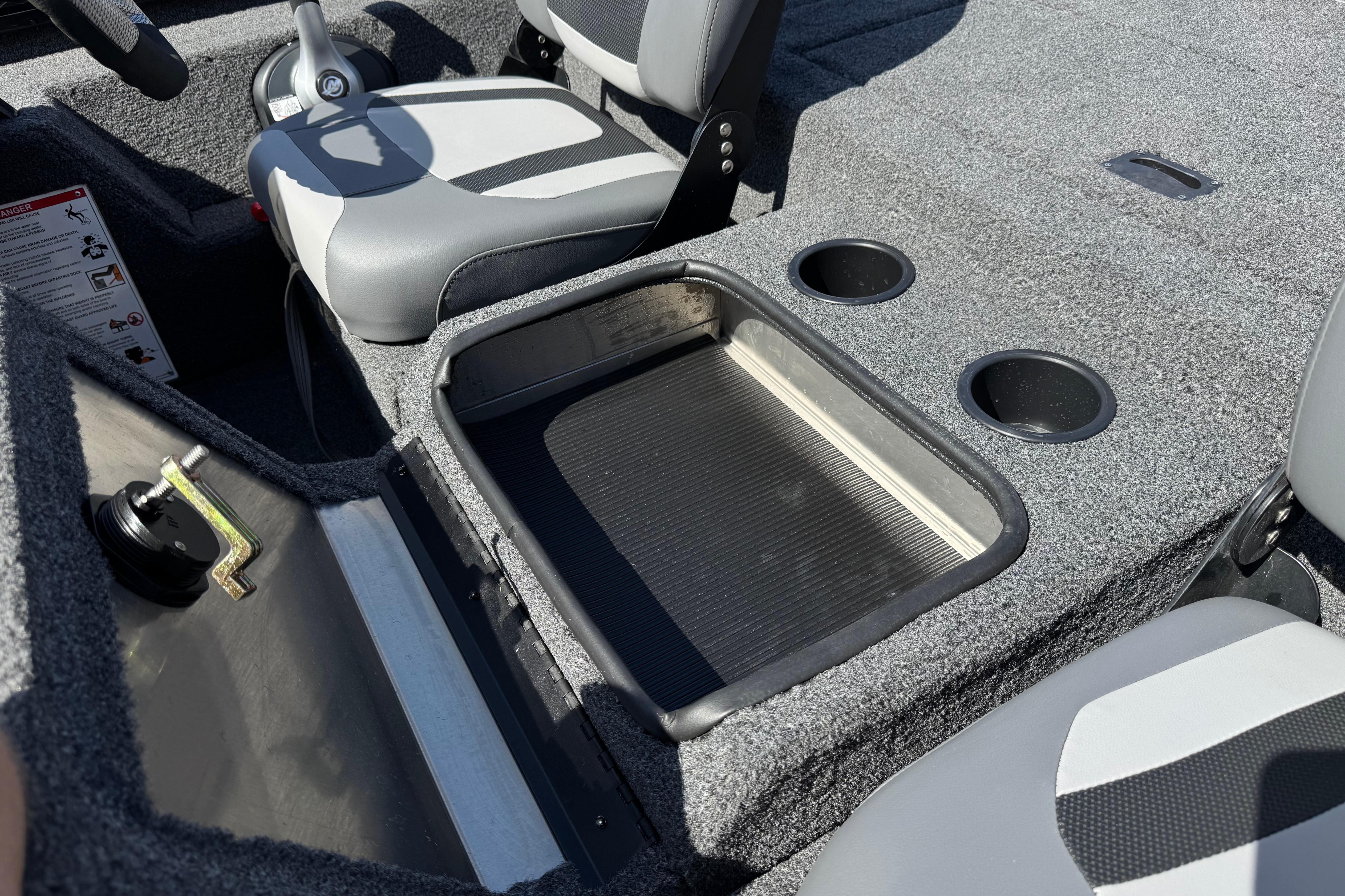 2024 Lowe Stinger 175 boat interior with seating and storage compartments.