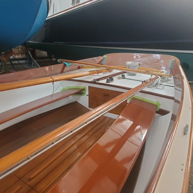 2003 Herreshoff 12.5 sailboat with wooden interior details.