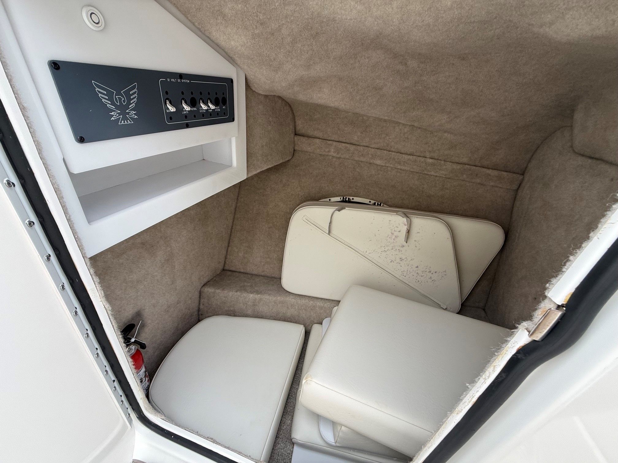 Interior of a 1998 Formula Thunderbird boat with seat cushions.
