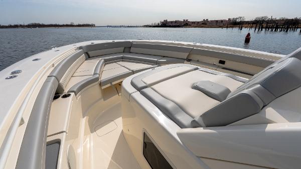 2025 Scout 425 LXF boat interior with luxurious seating on calm water.
