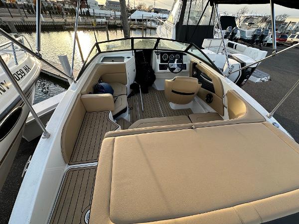 Interior view of a 2021 Sea Ray SPX 190 boat at the marina.