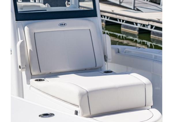 Manufacturer Provided Image: 2026 Sea Hunt Gamefish 28 Coffin Box boat seat, white upholstery, docked at marina.