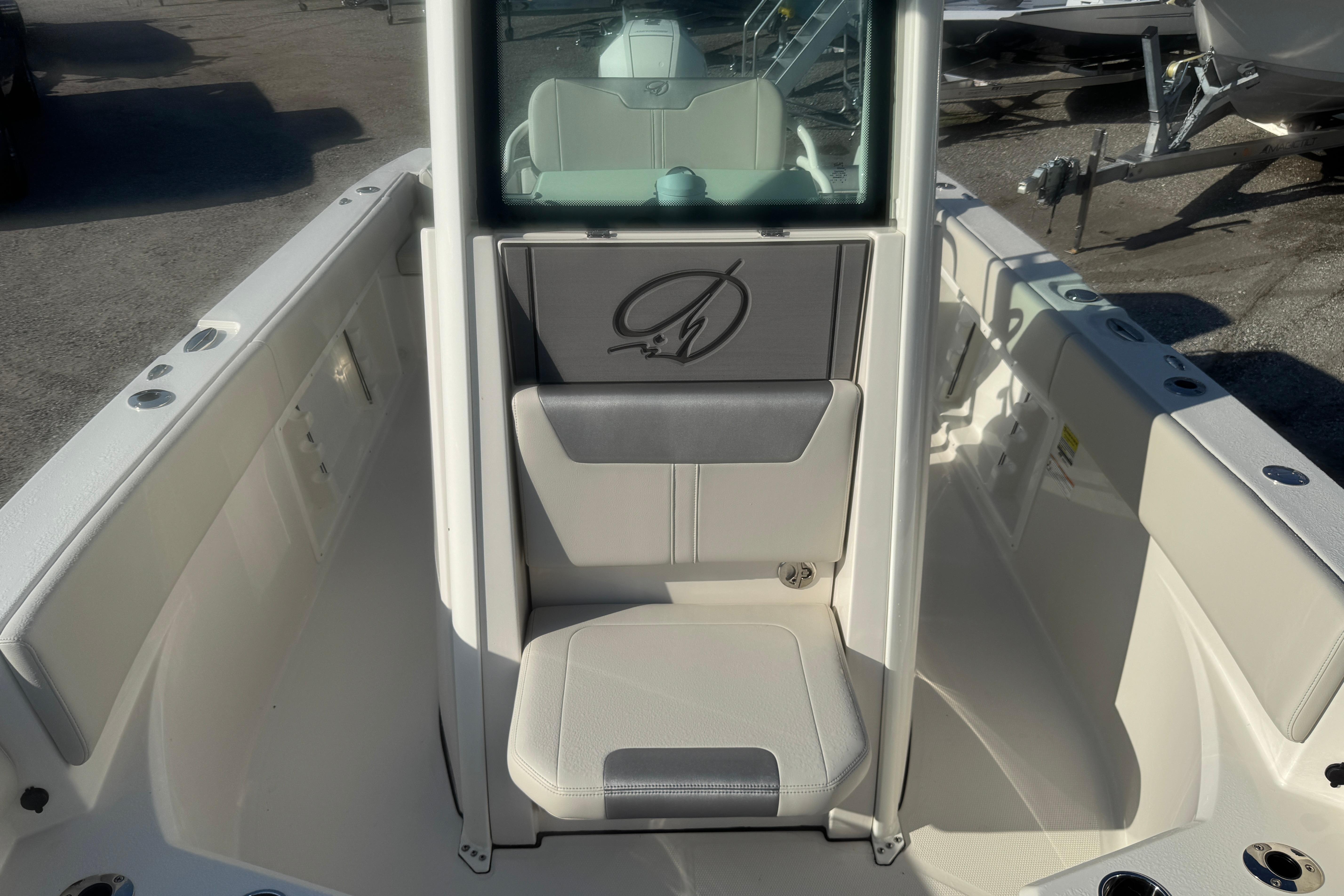 2026 Sailfish 232 CC boat interior with seating and storage compartments.