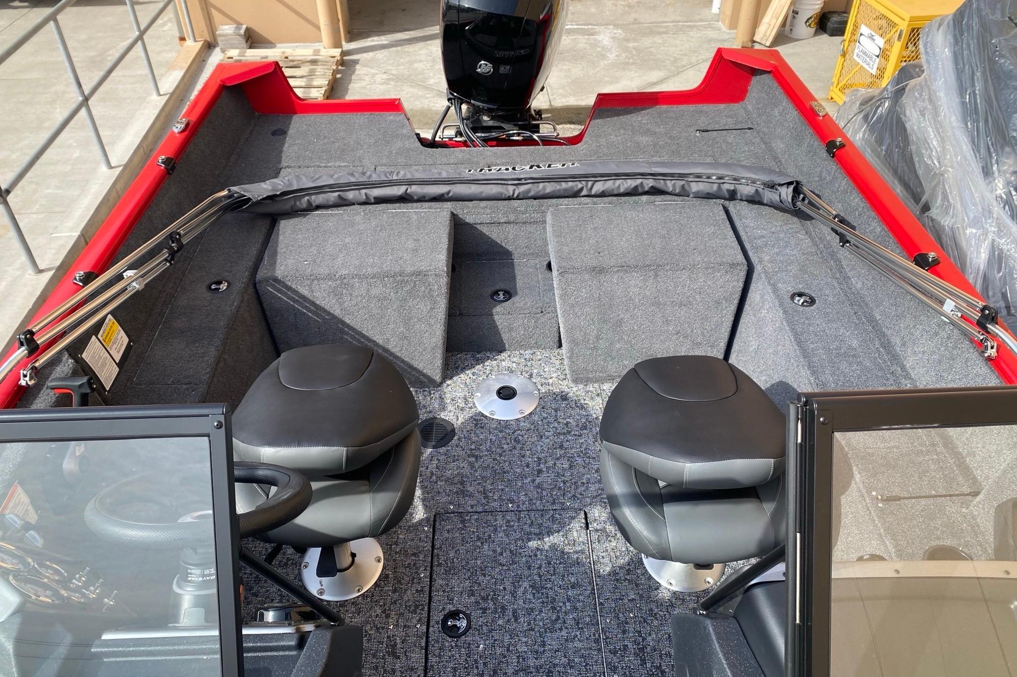 2026 Tracker Pro Guide V-175 Combo boat interior with seating and storage.