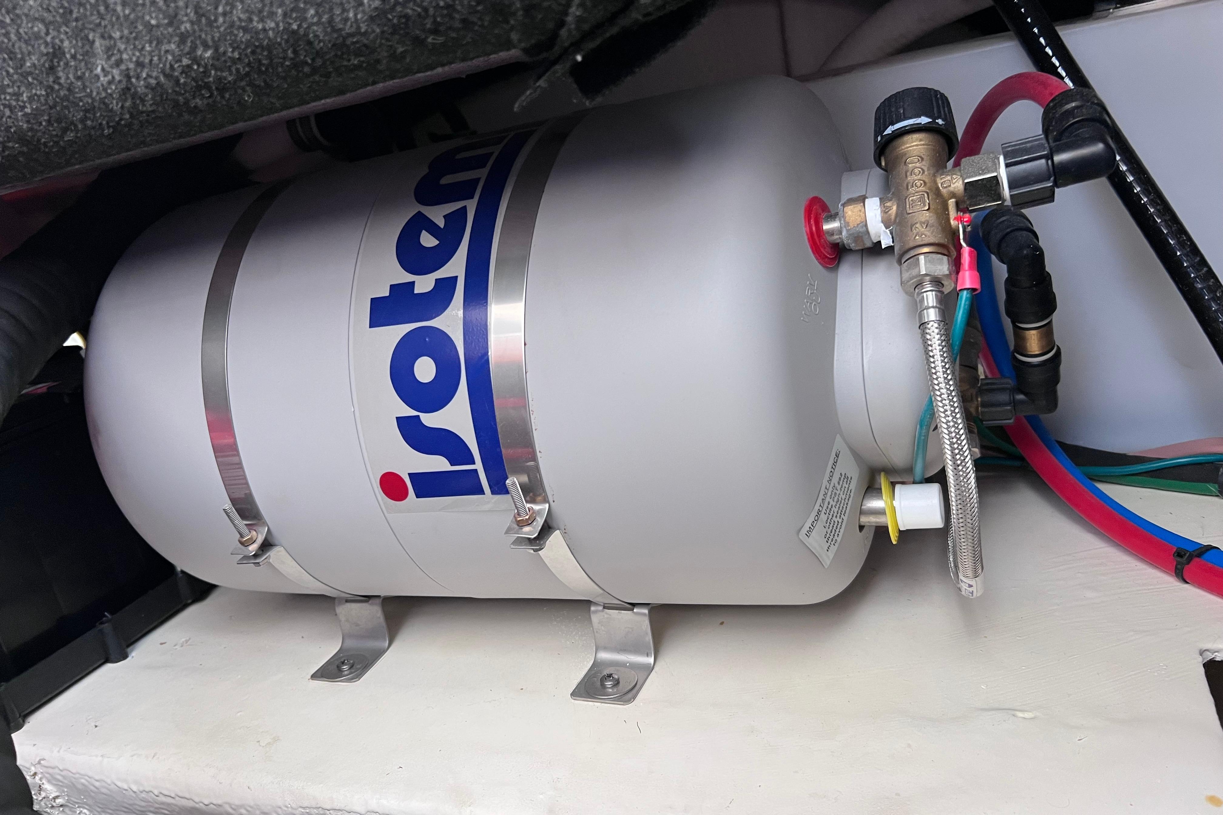 Isotemp water heater in 2024 Regal 26 XO boat engine compartment.