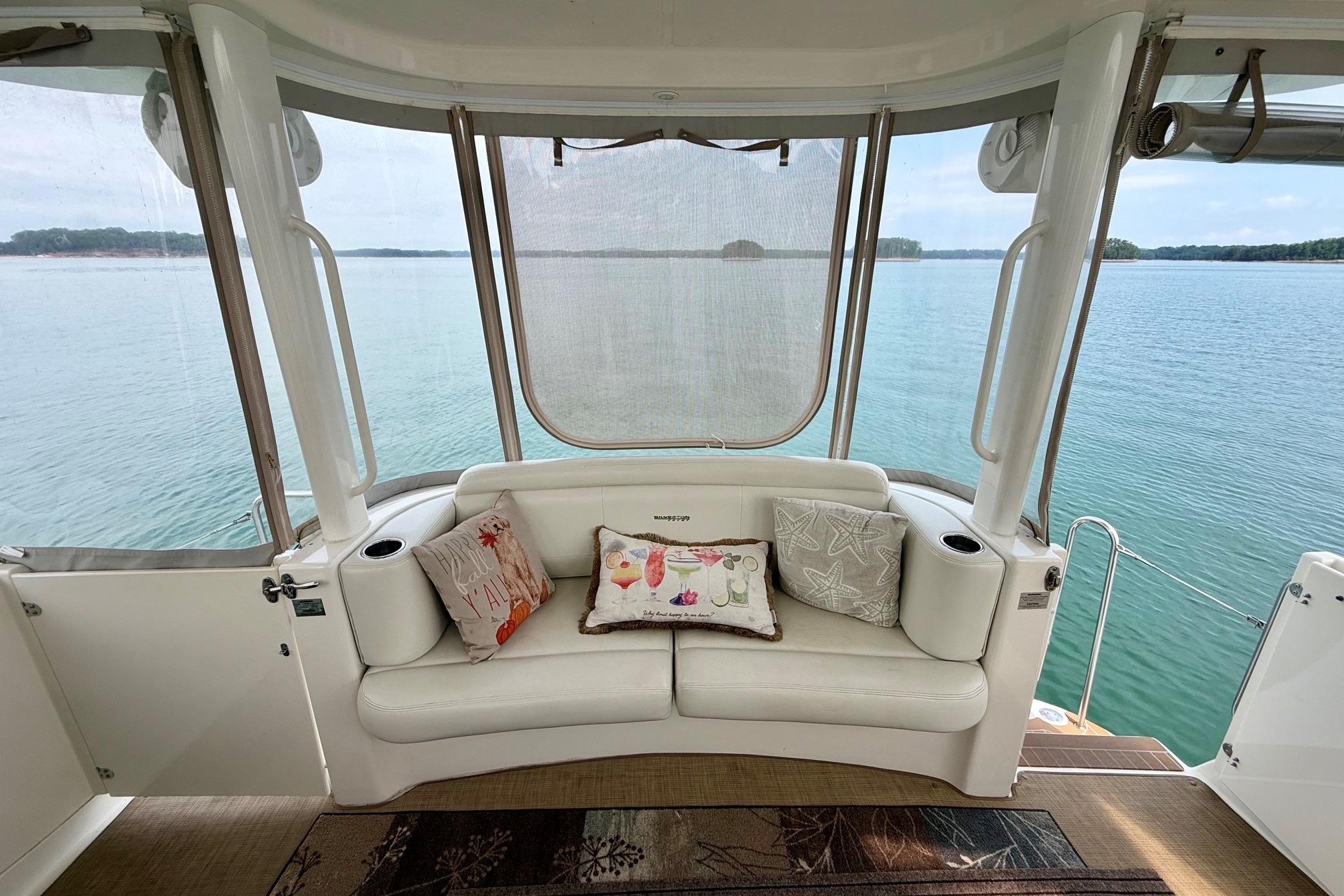 Interior view of 2004 Silverton 39 Motor Yacht with scenic water backdrop.