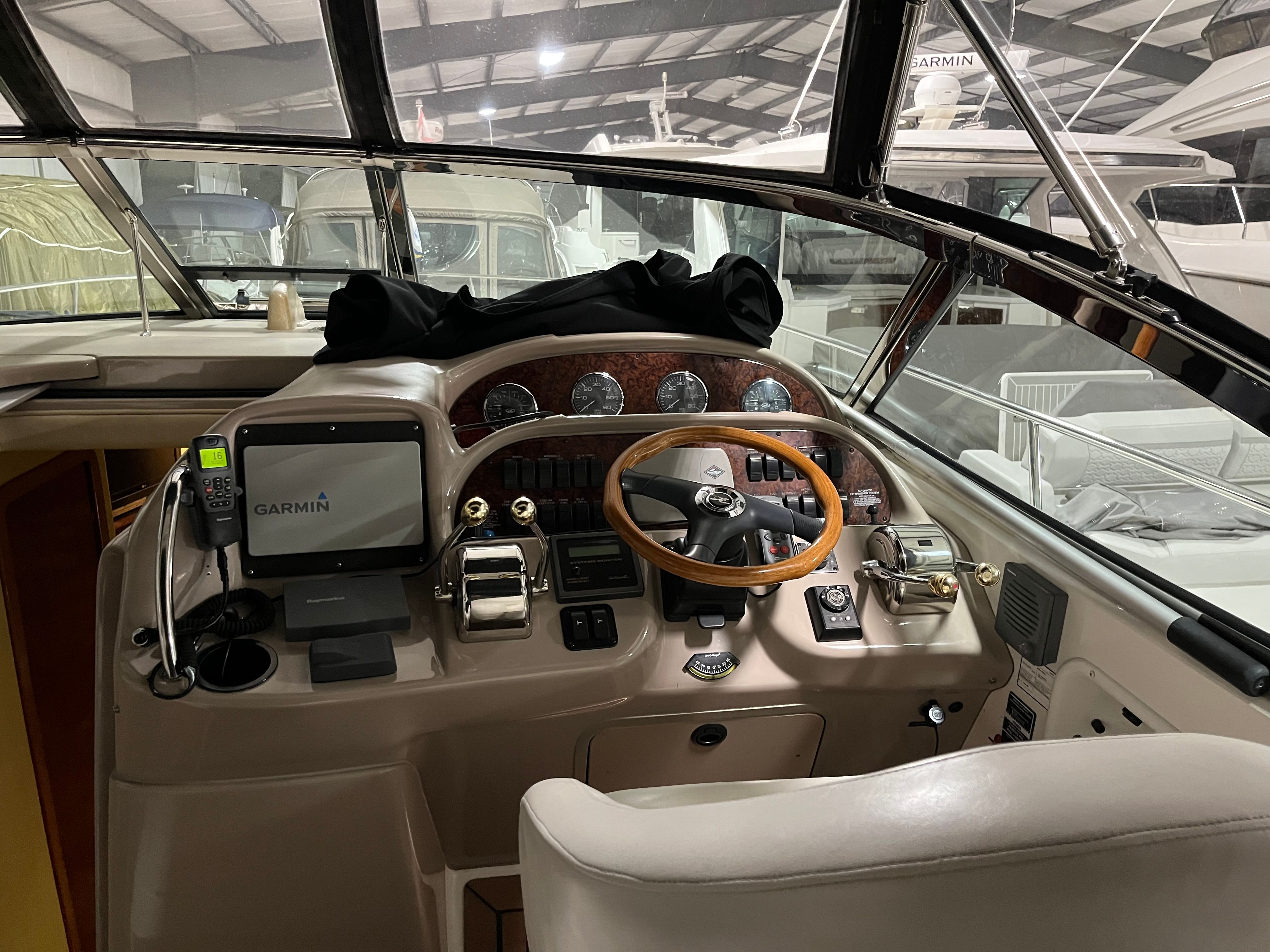 Interior view of a 2005 Sea Ray Sundancer yacht cockpit.