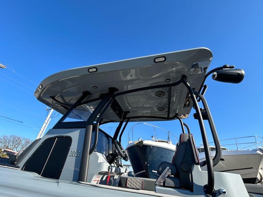 2024 Glasstream 32 GSX boat with sleek design and modern features under clear blue sky.