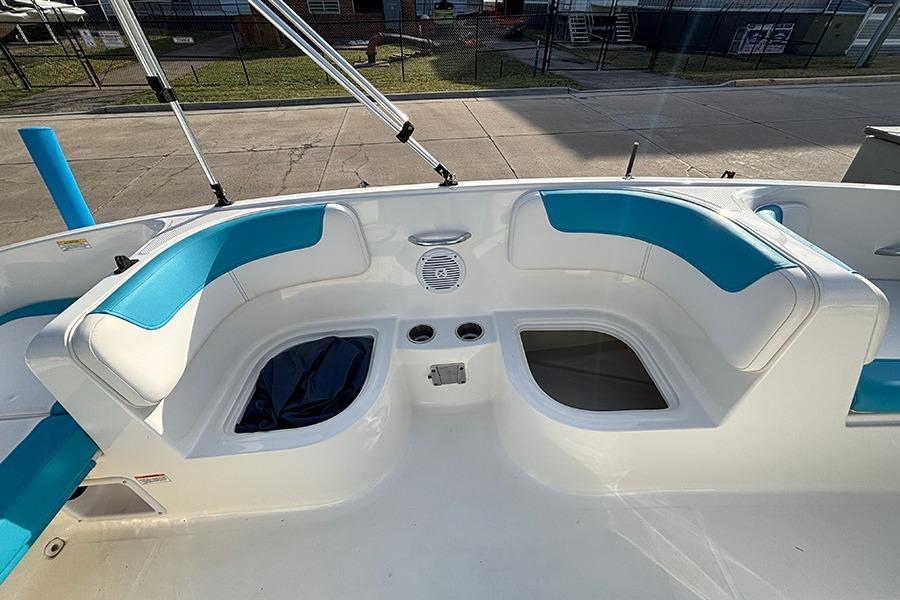 2021 Bayliner Element E16 boat interior with blue and white seating.