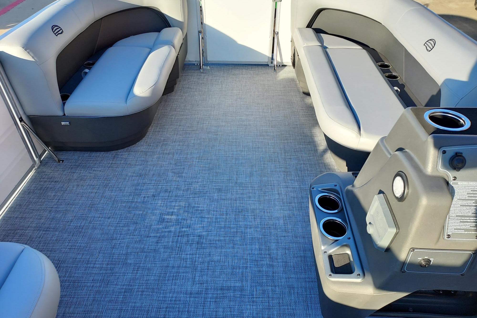 2026 Sun Tracker Party Barge 16 DLX interior with spacious seating and modern design.