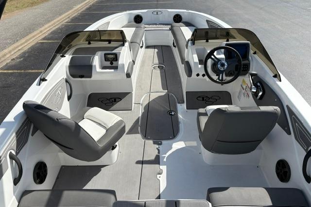 2024 Tahoe T21 boat interior with modern seating and steering console.