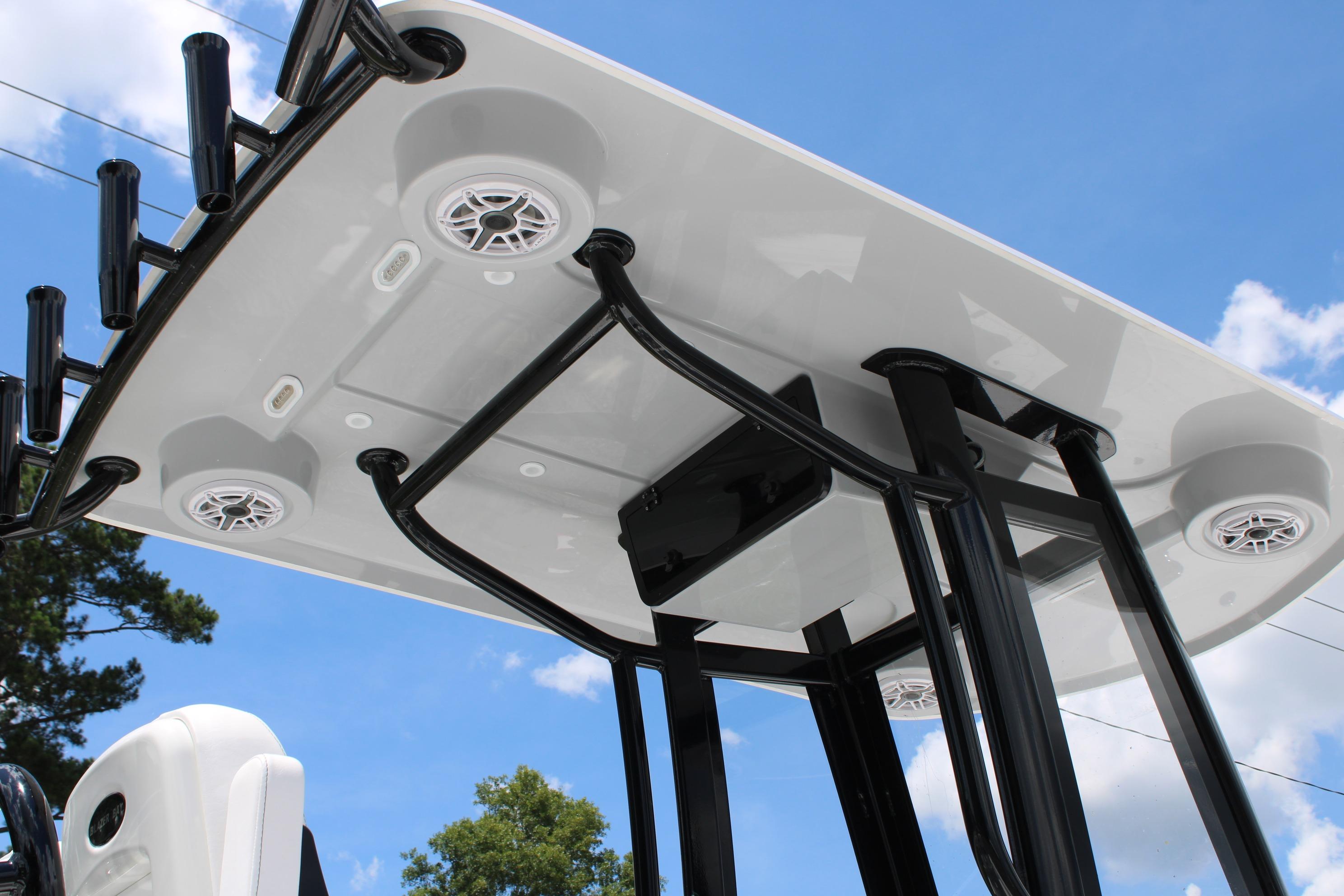 T-top of 2027 Blazer Bay Makaira 2800 boat with speakers and rod holders.