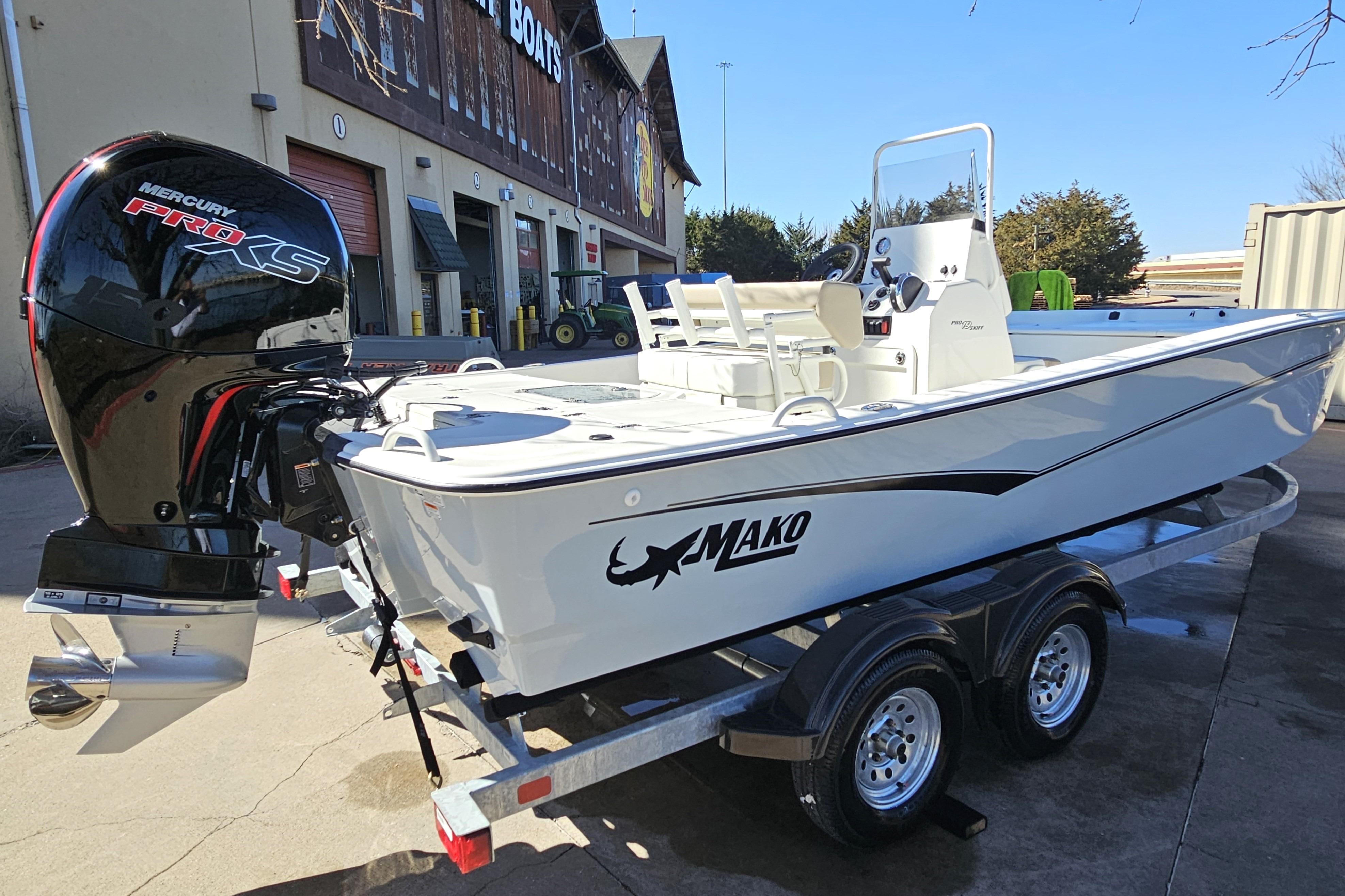 2026 Mako Pro Skiff 19 CC boat with Mercury Pro XS engine on trailer.