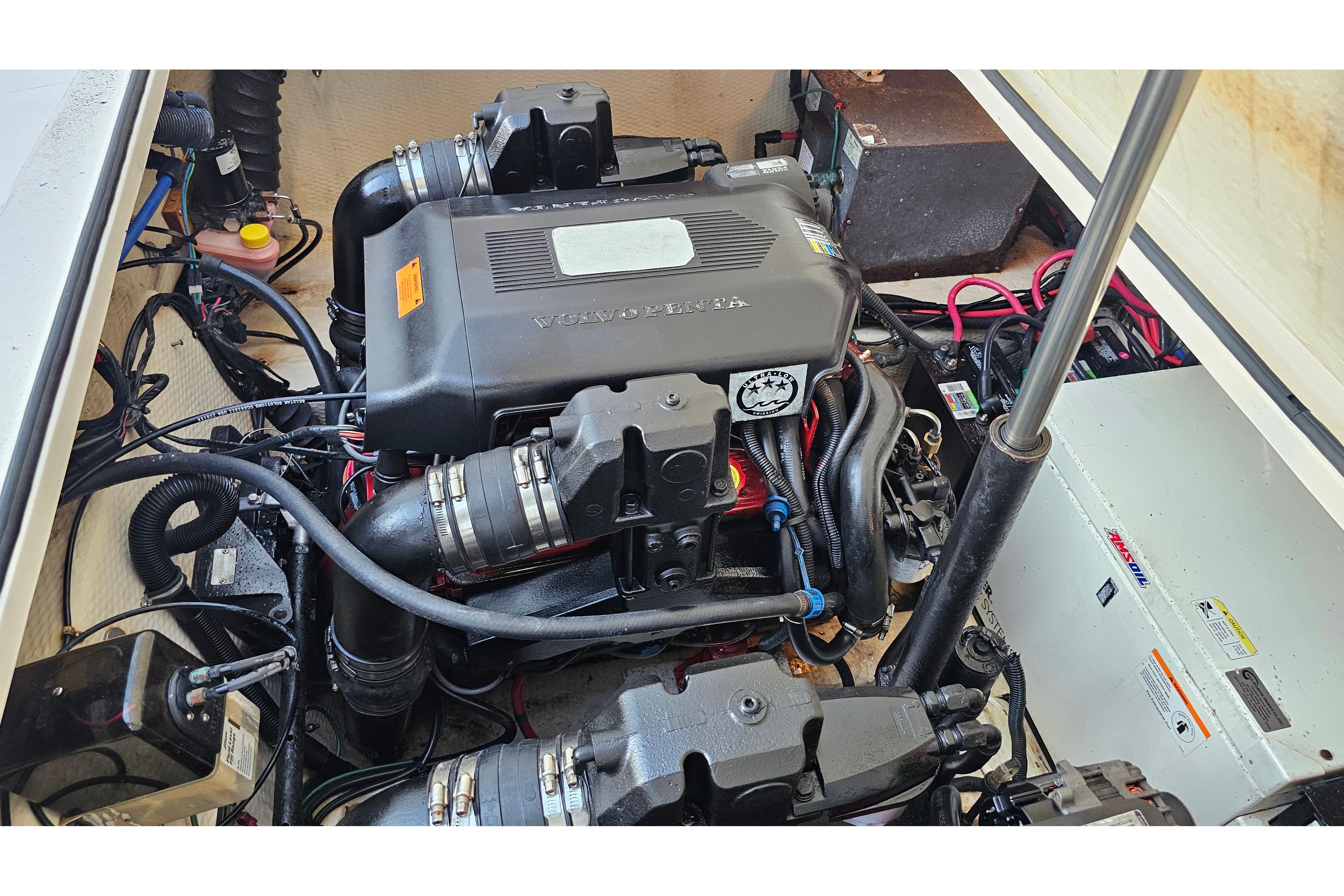 Engine compartment of a 2005 Regal 3060 Window Express boat, featuring a Volvo Penta engine.