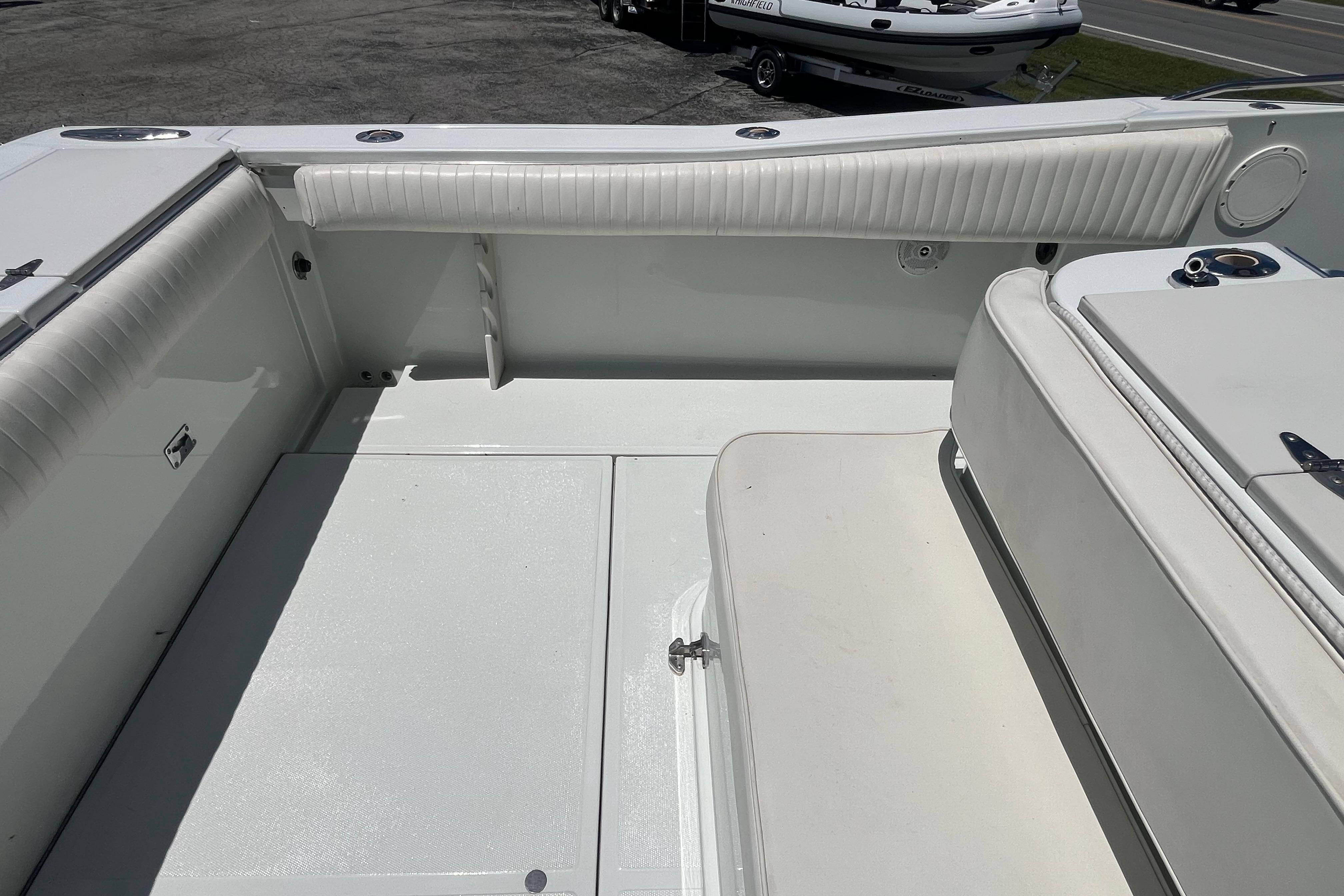 1997 Stamas boat interior with white seating and clean deck.