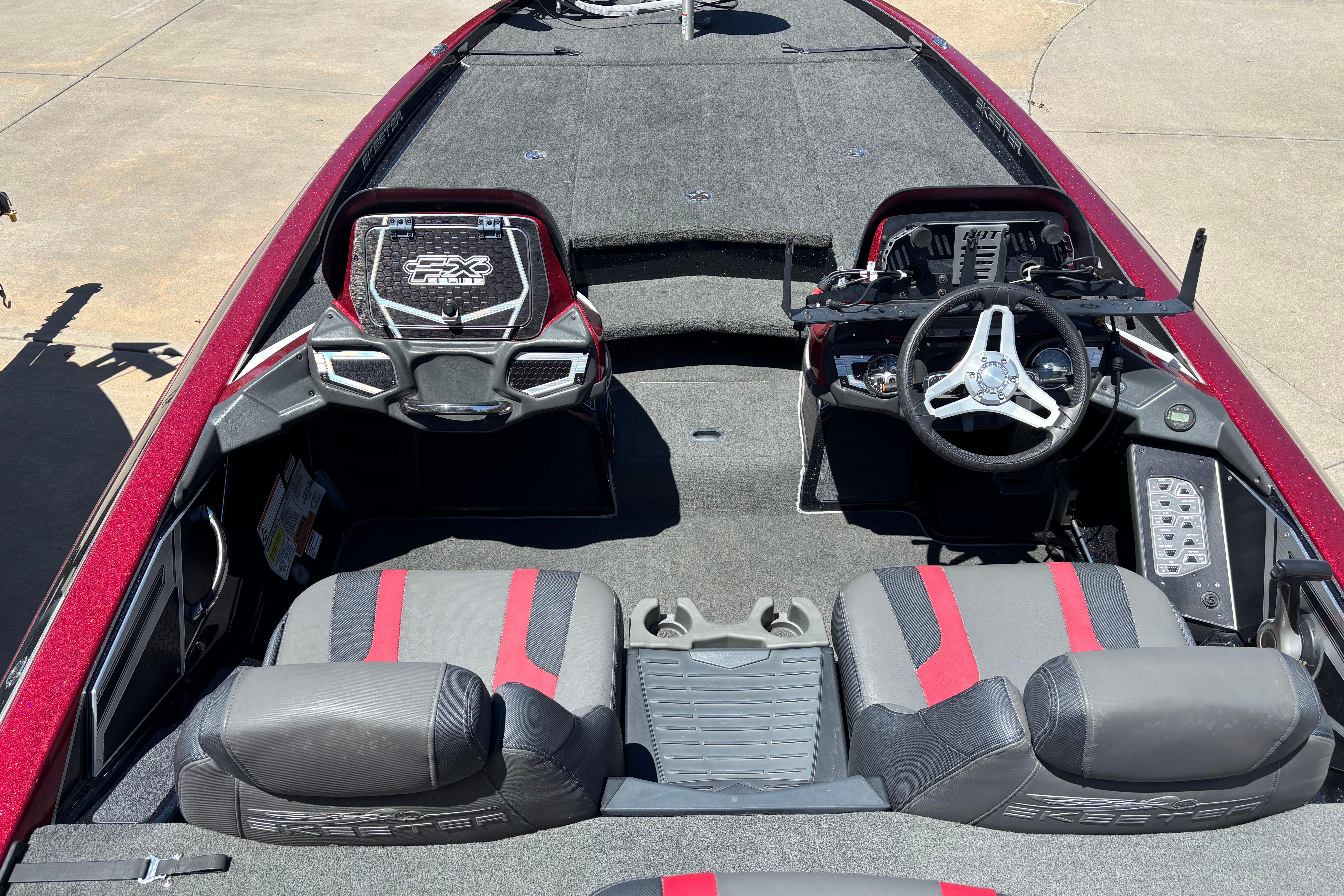 2017 Skeeter FX21 boat interior with dual seats, steering wheel, and control panel.