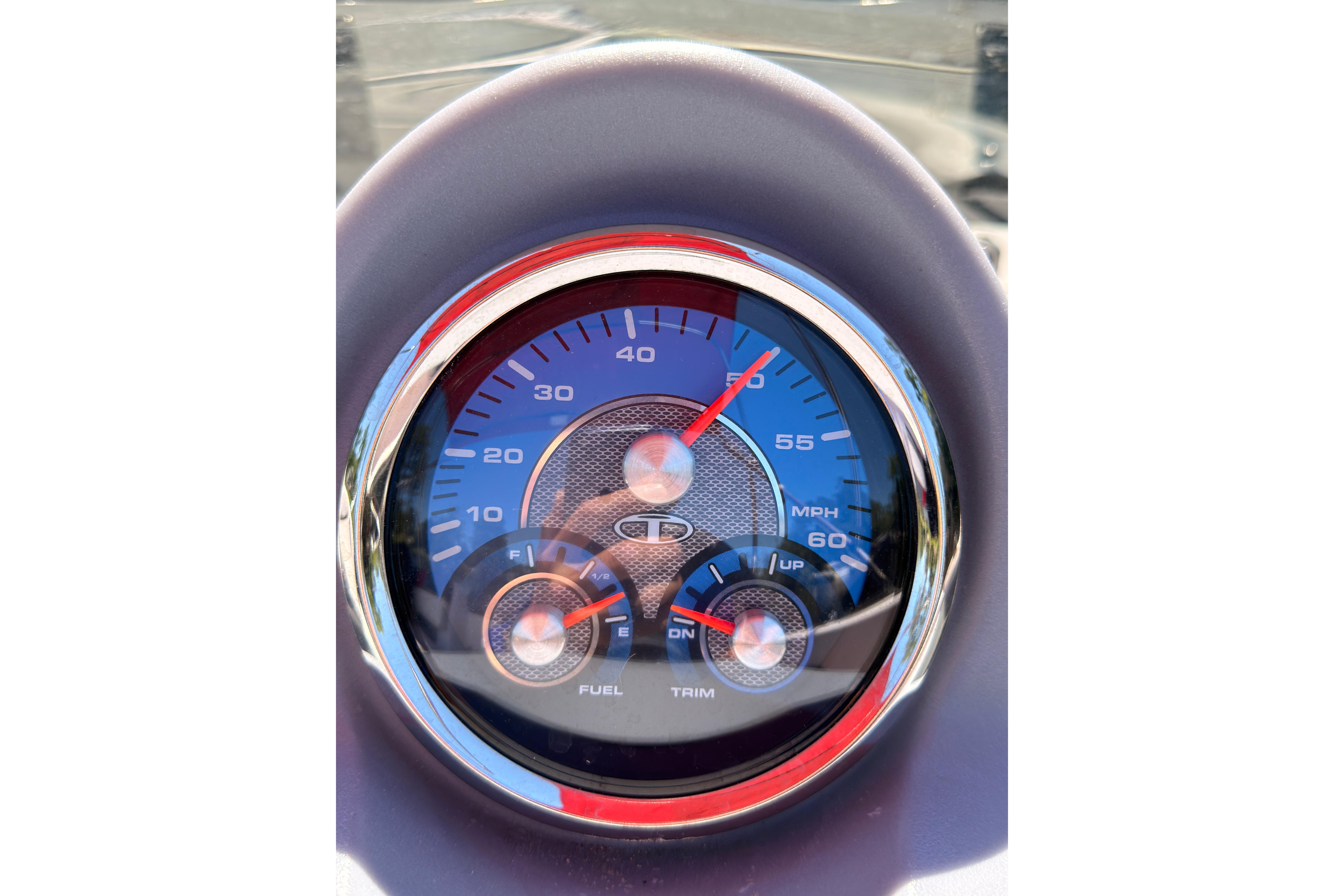 Close-up of 2022 Tahoe T18 speedometer and fuel gauge, displaying speed in MPH.
