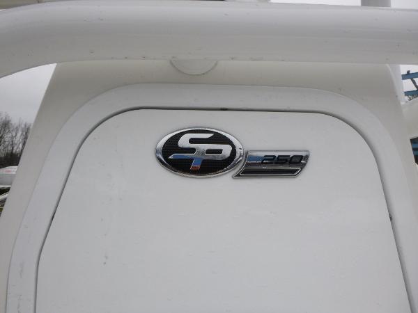 2025 Sea Pro 250 Bay boat emblem on white surface.