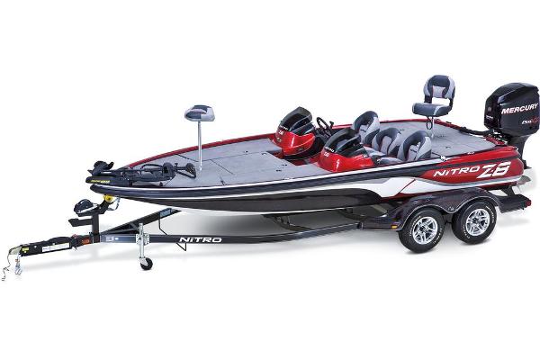 Manufacturer Provided Image: 2013 Nitro Z-8 bass boat with trailer, featuring sleek design and Mercury outboard motor.