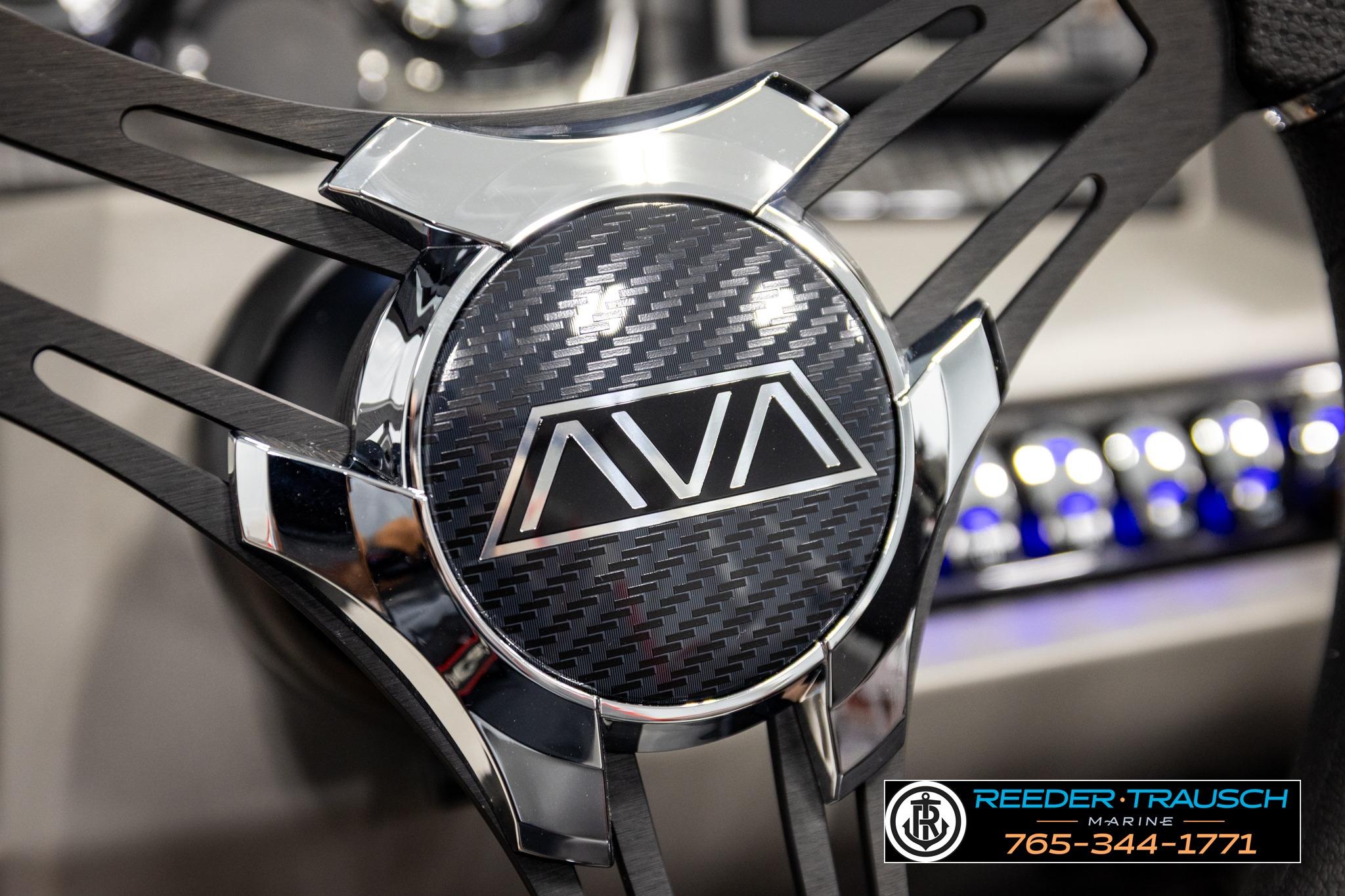 Steering wheel of 2026 Avalon LSZ QL with carbon fiber design and chrome accents.