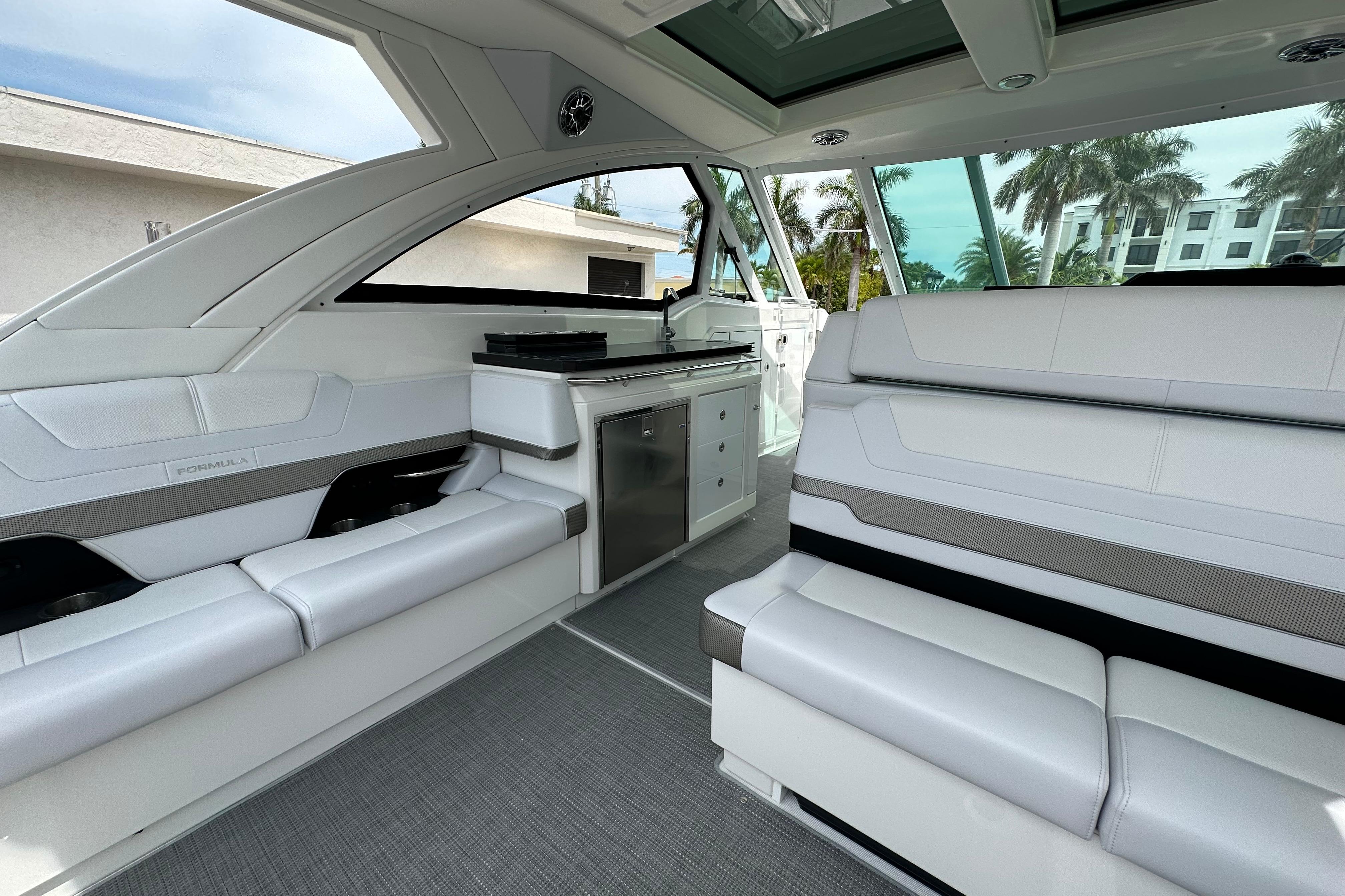 Interior of 2021 Formula 380 Super Sport Crossover OB, featuring sleek seating and modern design.
