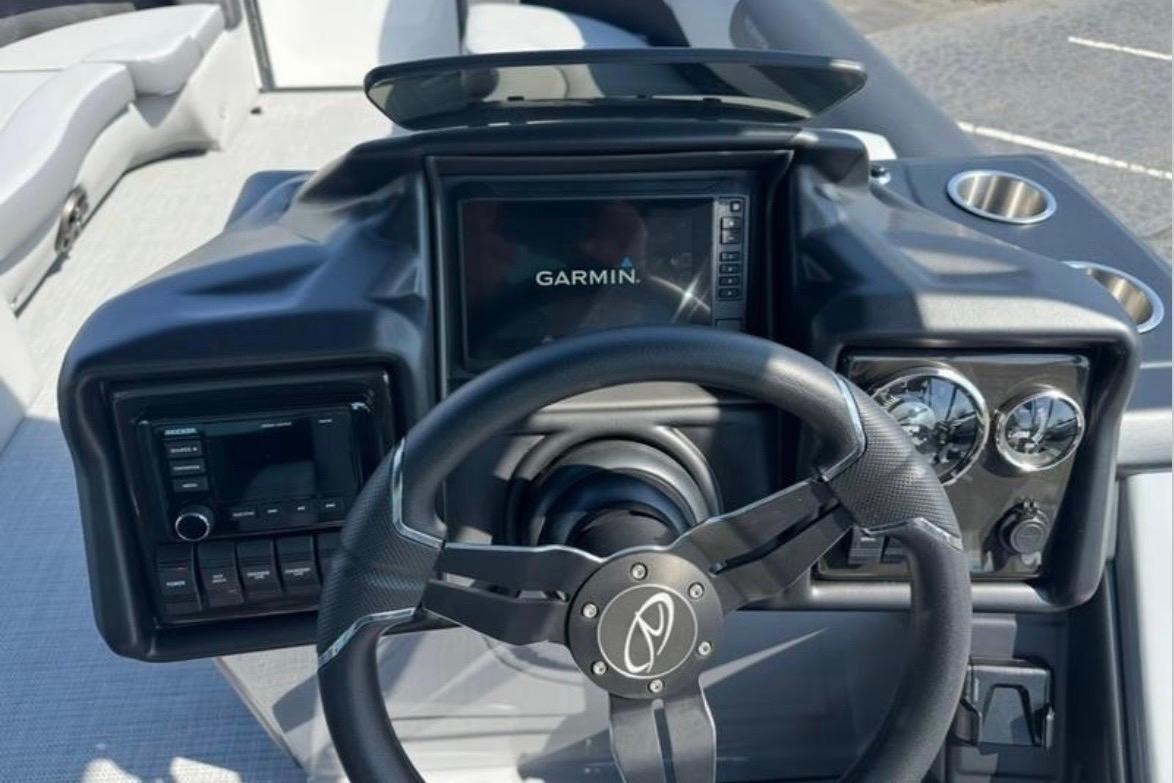 Steering console of 2025 Veranda Relax VR25VLC with Garmin display and controls.