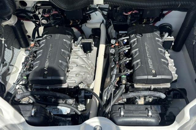 Twin engines of a 2014 Yamaha Boats 212X, showcasing high-performance components.
