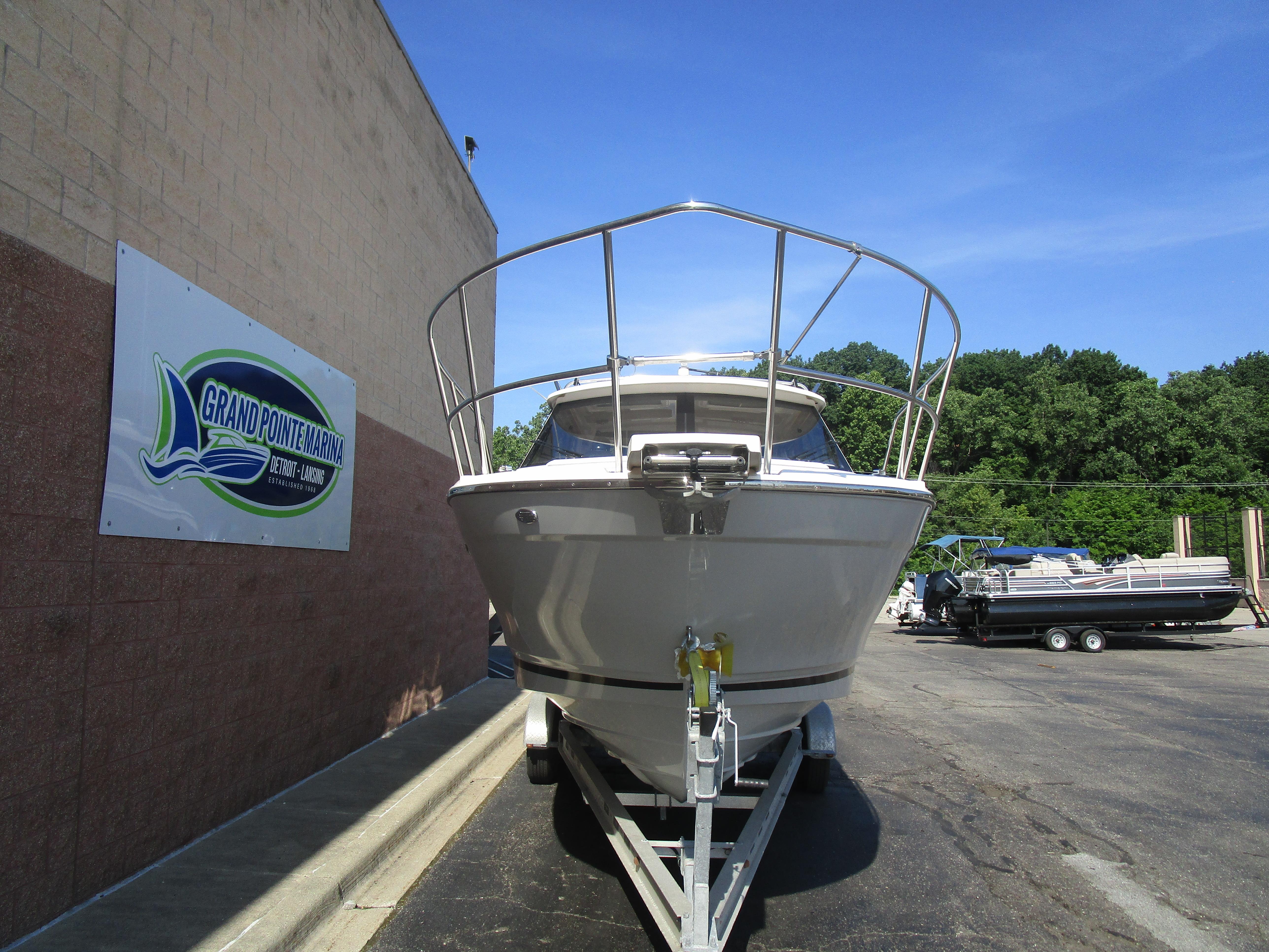 2025 Cutwater C-248 Coupe boat on trailer at Grand Pointe Marina.