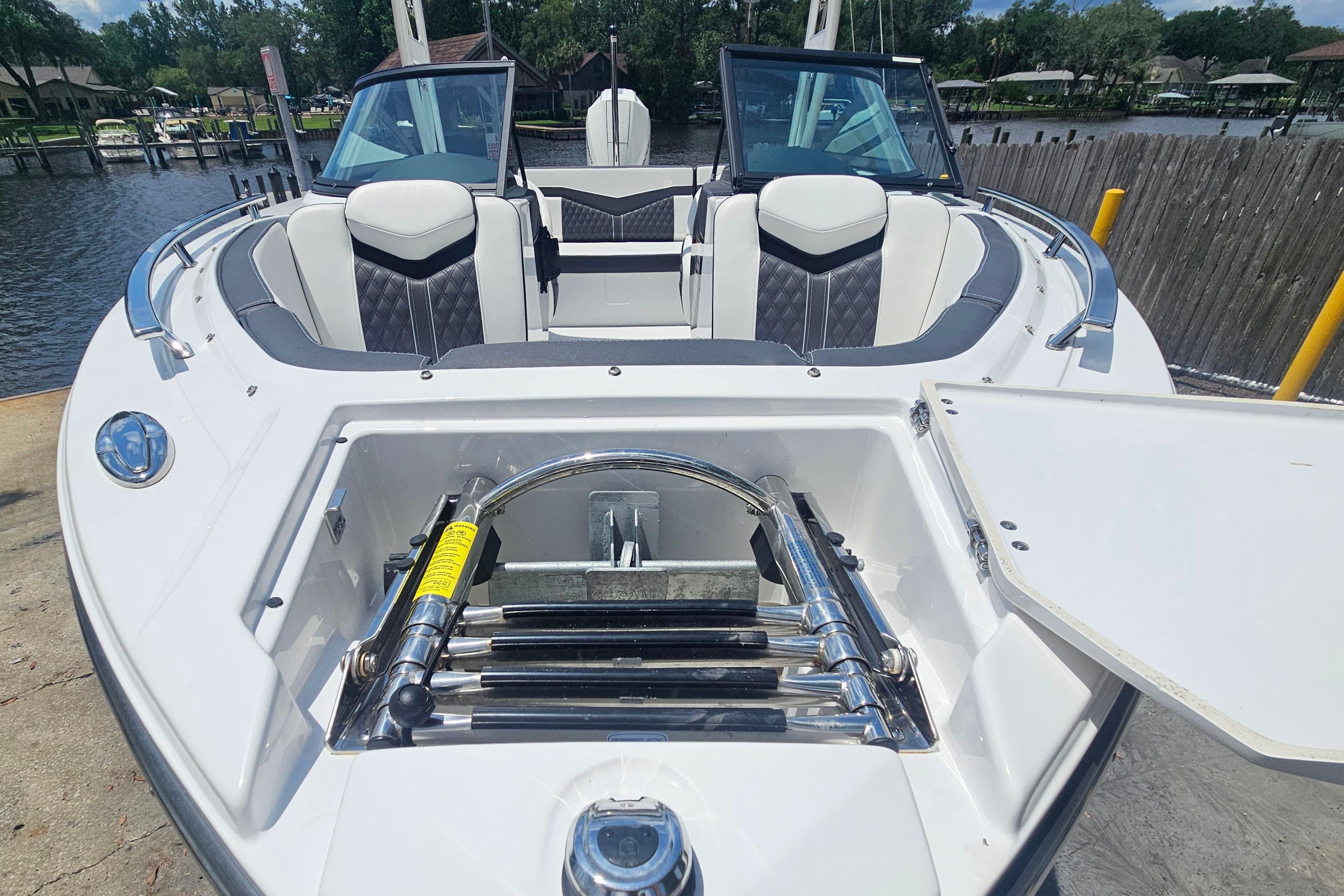 2024 Monterey 215SS Super Sport boat with open bow seating and storage compartment.