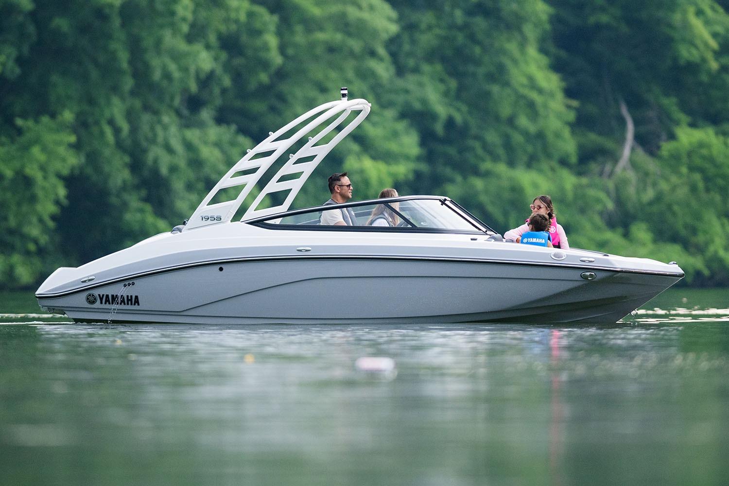 Manufacturer Provided Image: 2026 Yamaha Boats 195S on a serene lake with lush green background.