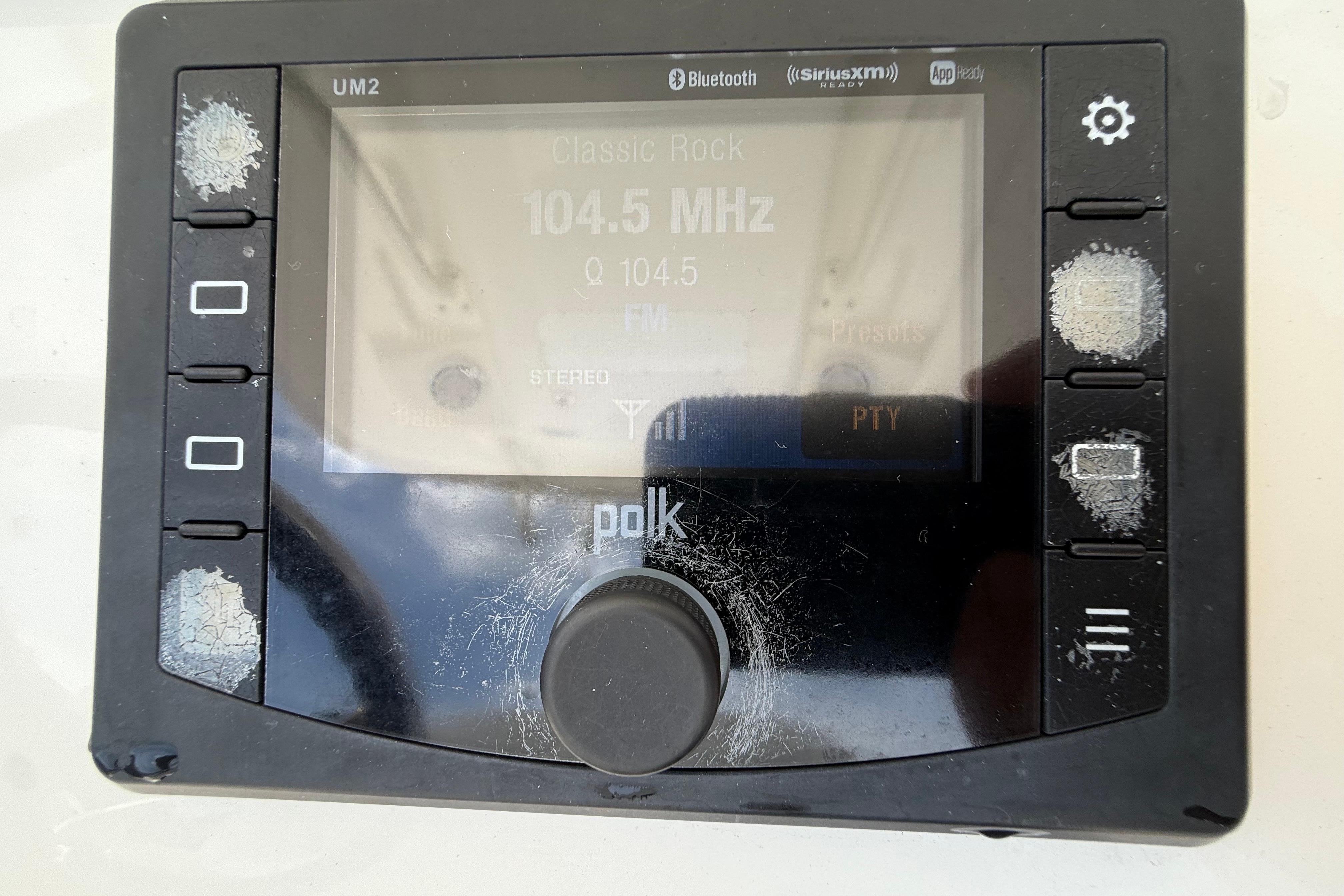 Polk stereo system displaying 104.5 MHz on a 2019 Regulator 26XO boat.