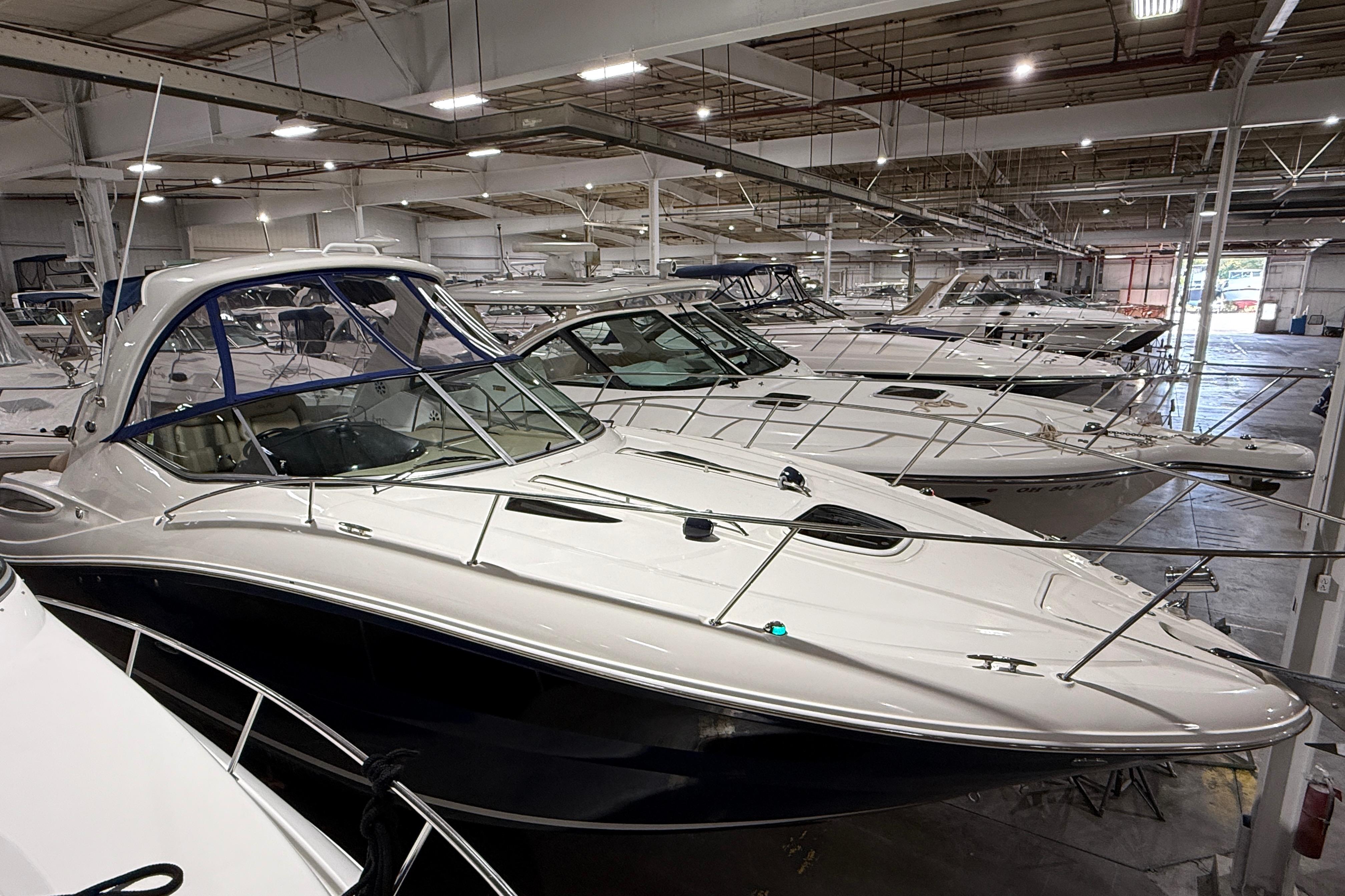2017 Sea Ray Sundancer 330 boats in indoor storage facility.