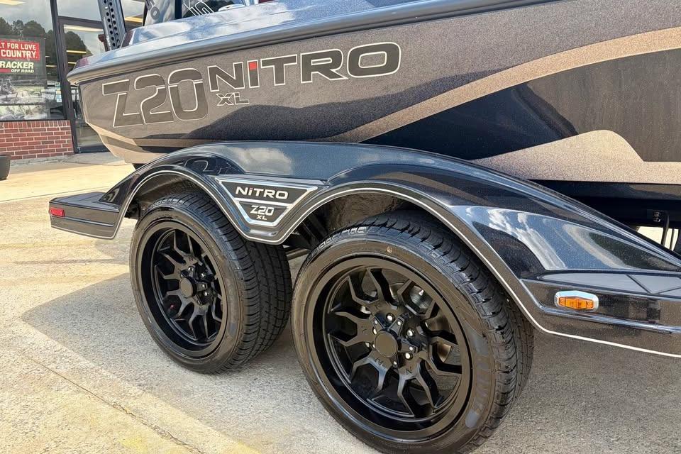 2026 Nitro Z20 XL Pro boat trailer with sleek black wheels and branding.