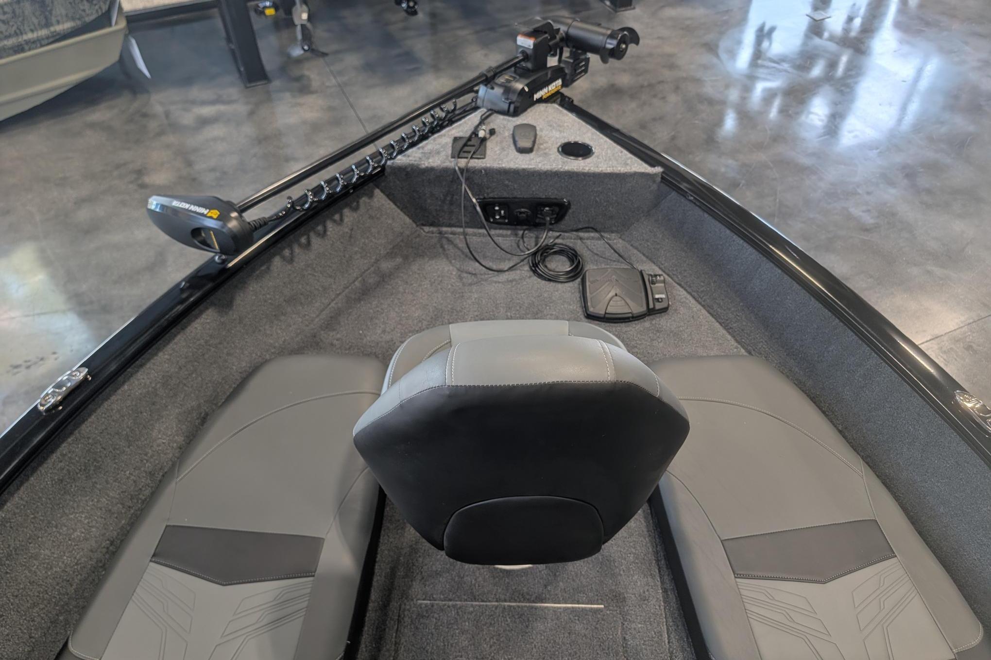 2026 Tracker Pro Guide V-175 Combo boat interior with seating and control panel.
