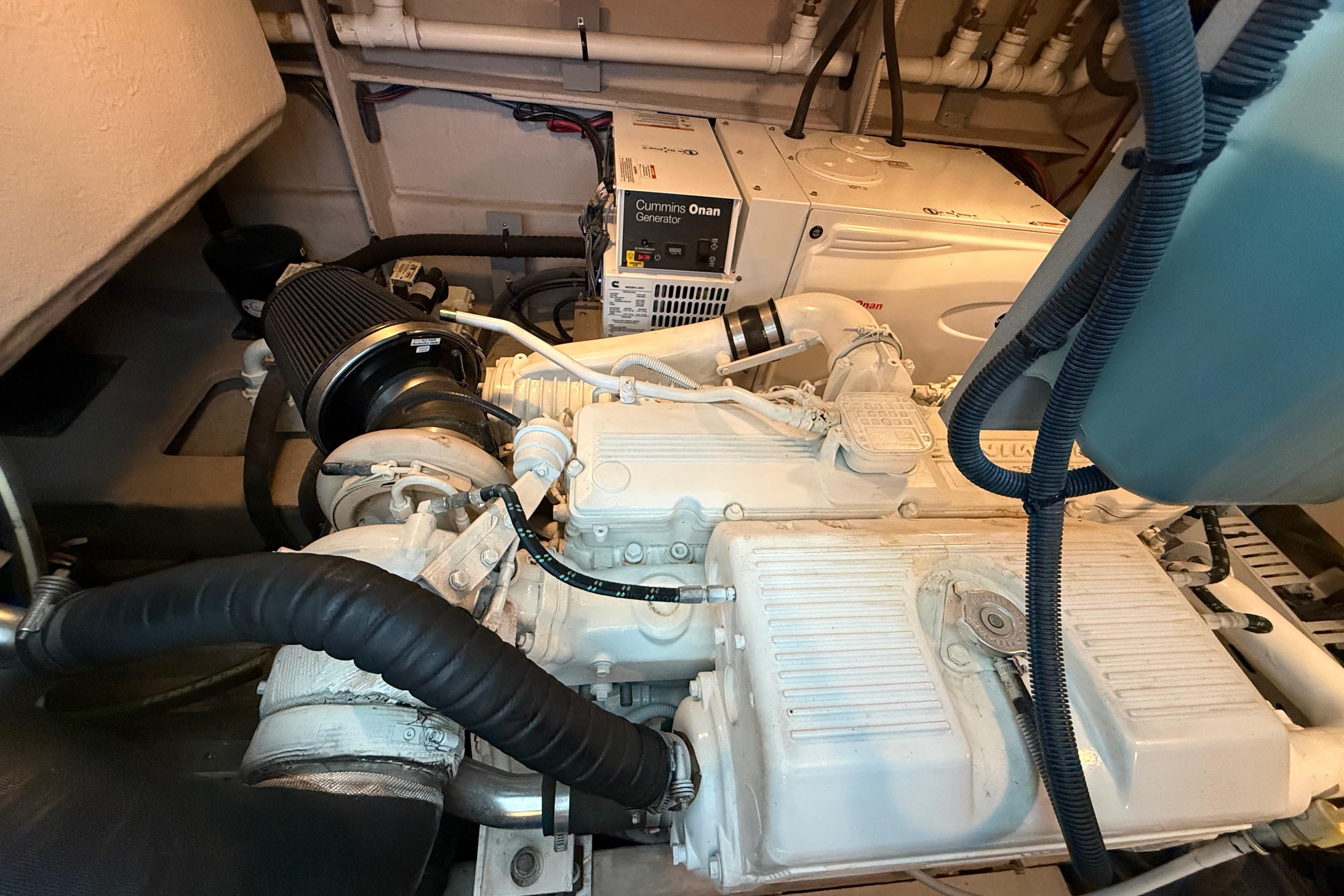 Engine room of 2016 Sea Ray Sundancer 510 with Cummins Onan generator.
