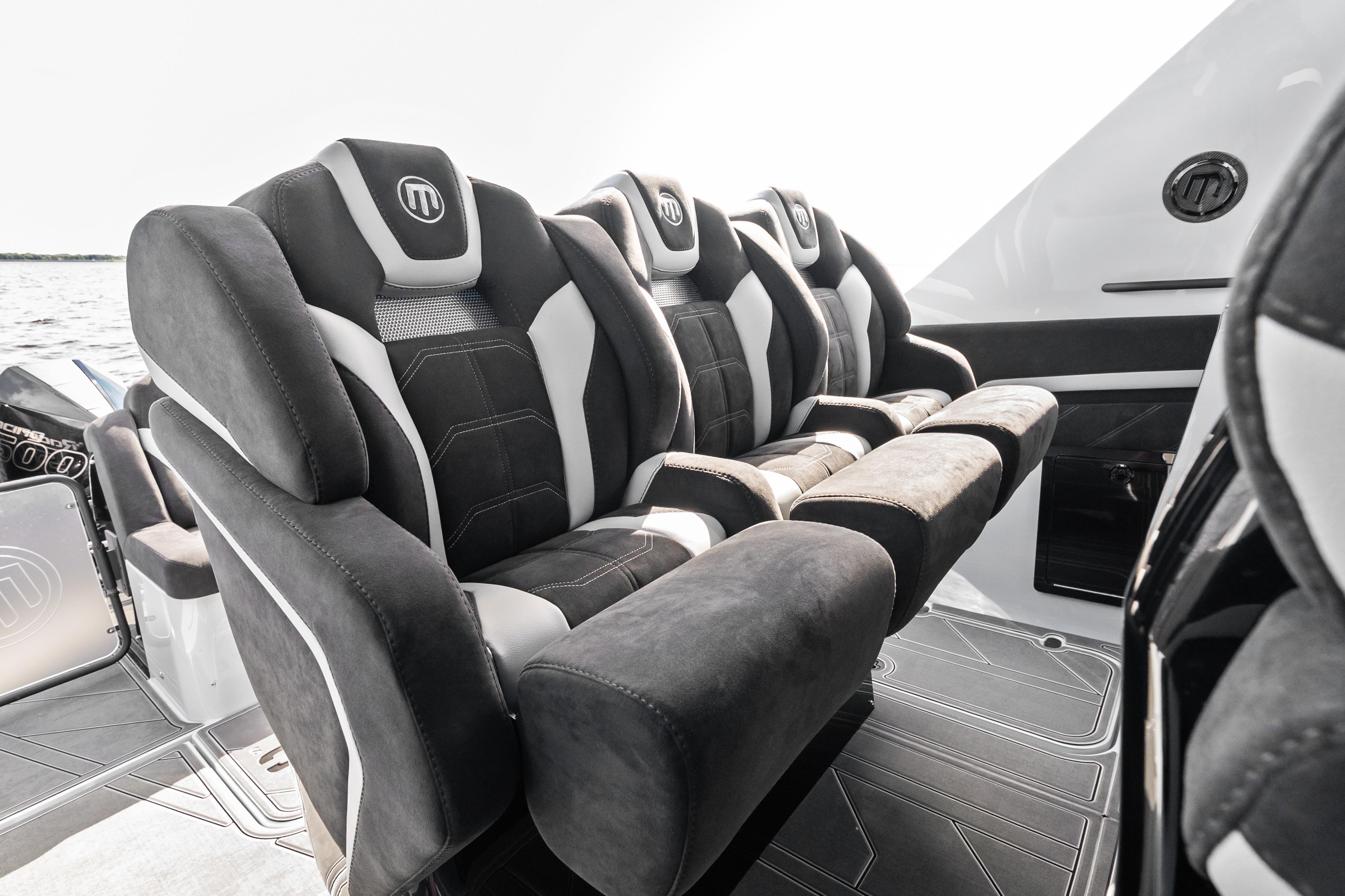 Luxurious seating on 2027 Mystic Powerboats M4200, featuring sleek design and premium materials.