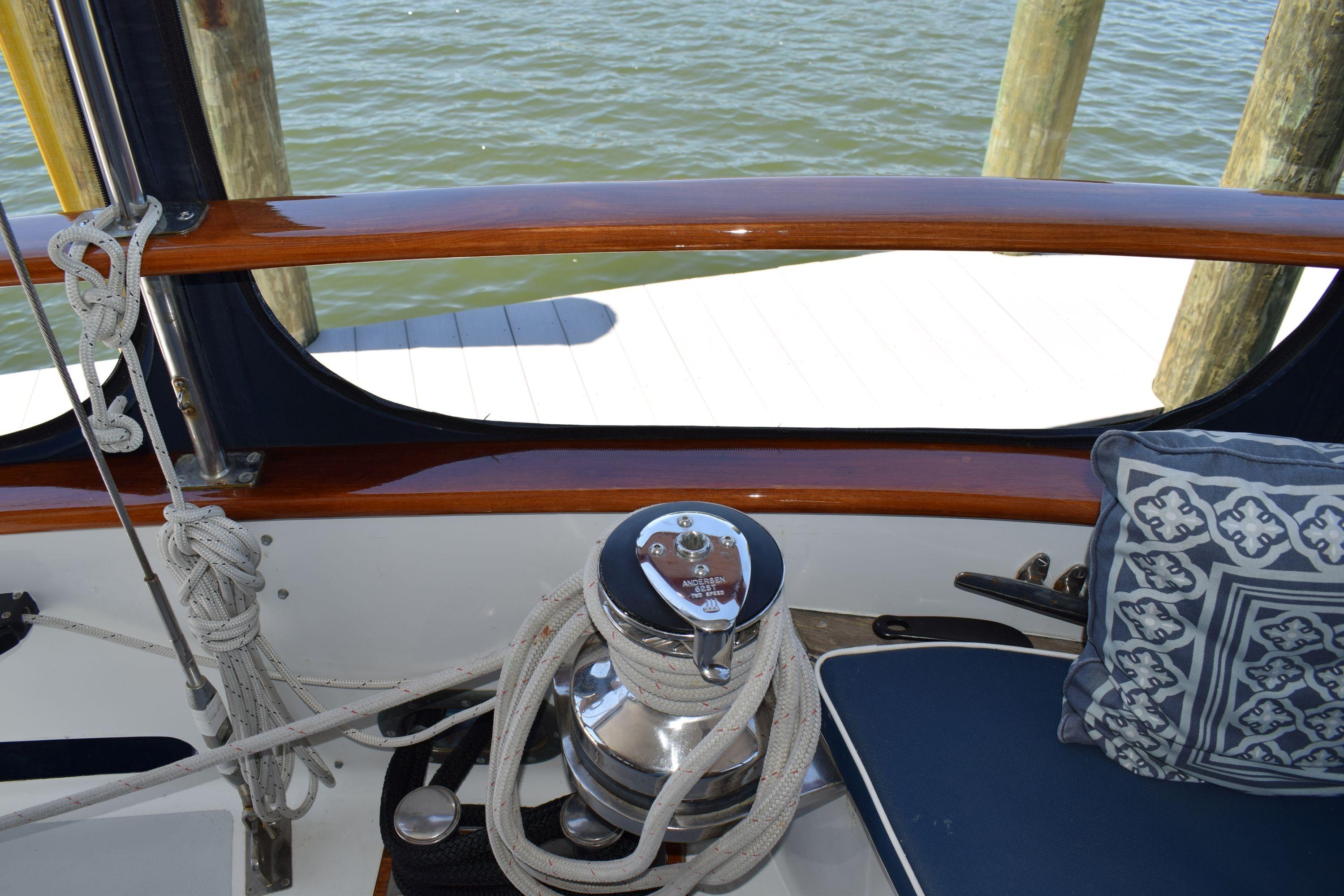 Deck view of 1980 Cheoy Lee 52 Motorsailer with ropes and nautical decor.