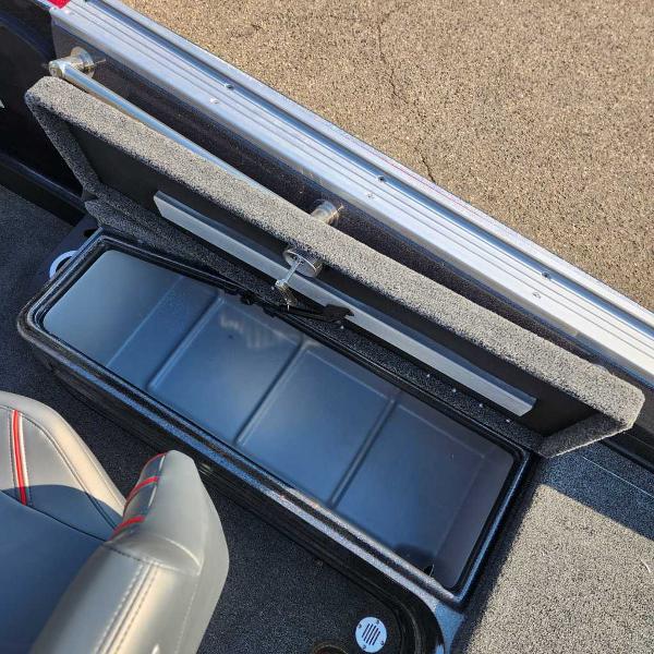 2024 Nitro ZV20 Pro boat storage compartment with open lid and seating.