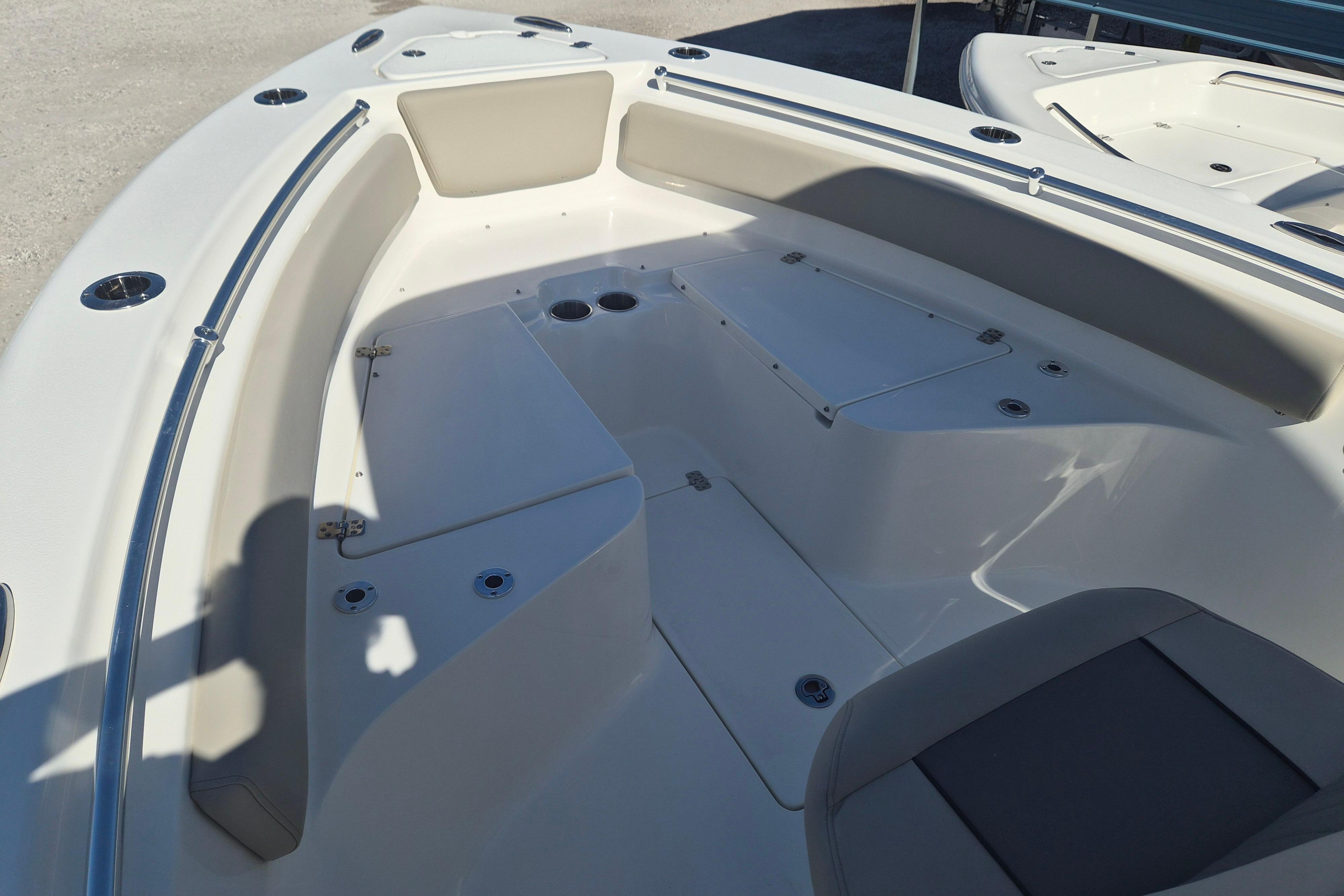 2026 Key West 239 FS boat interior with seating and storage compartments.