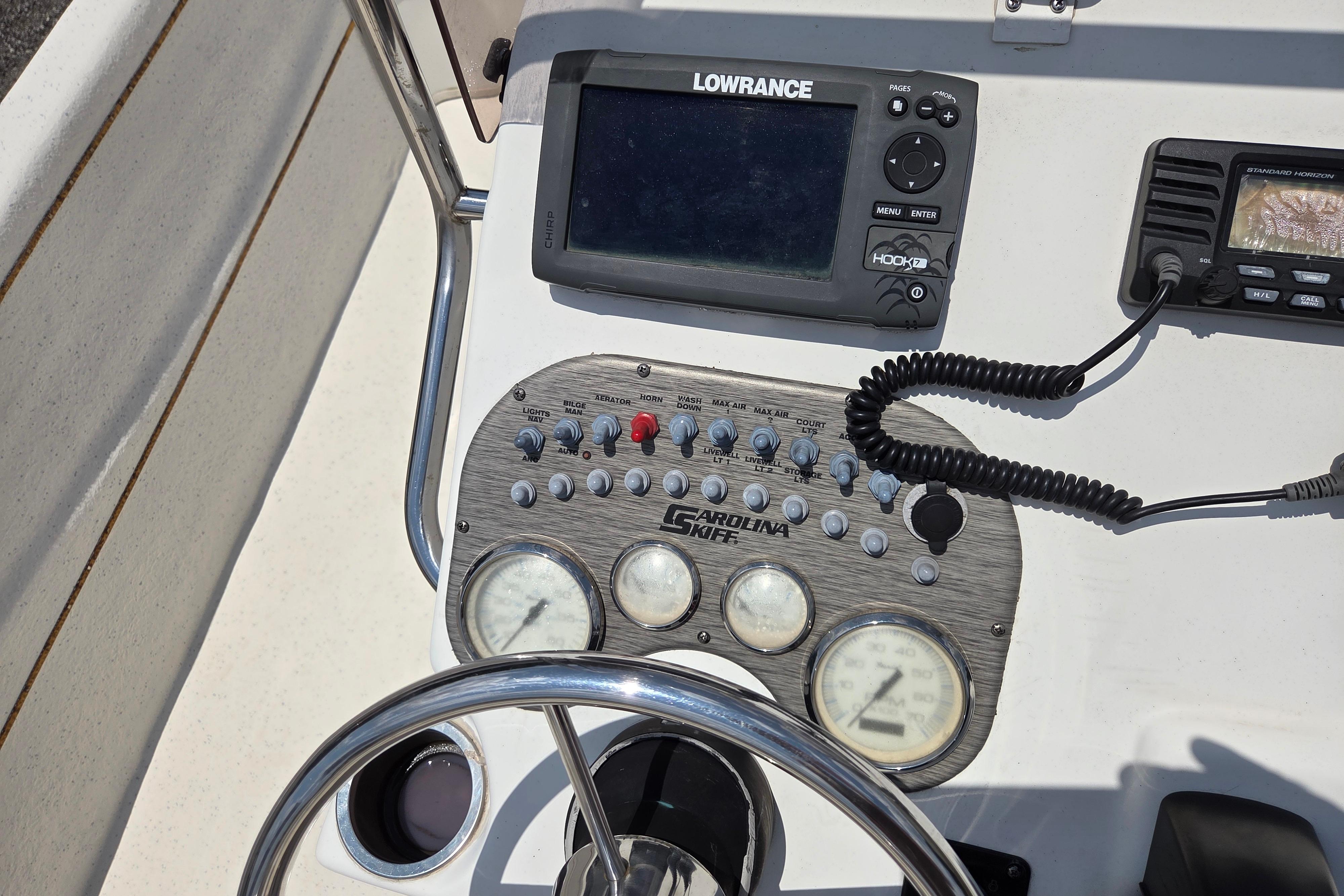 Control panel of a 2016 Carolina Skiff 198 DLV with navigation equipment.