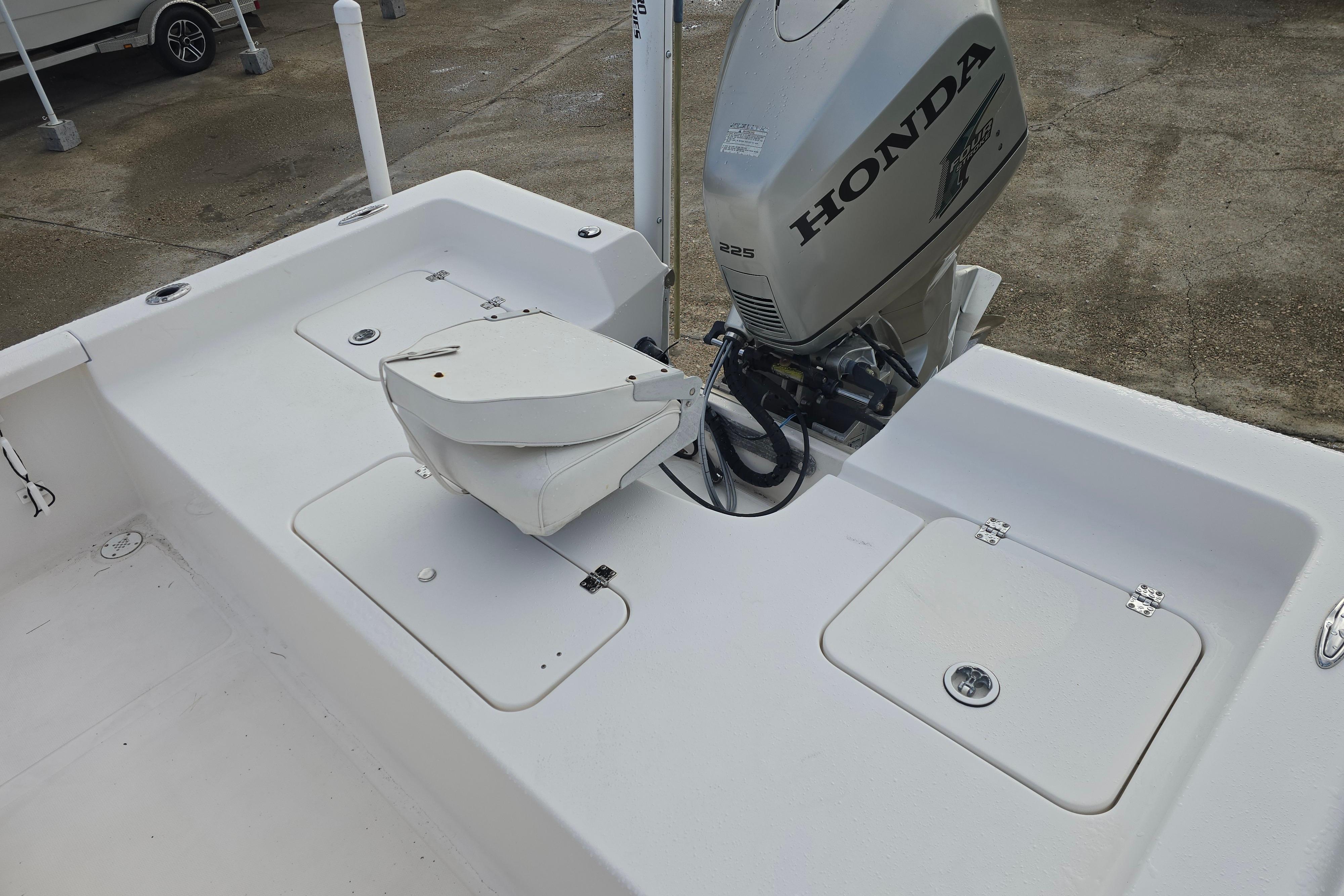 2011 Tidewater 2400 Bay Max boat with Honda 225 outboard motor.