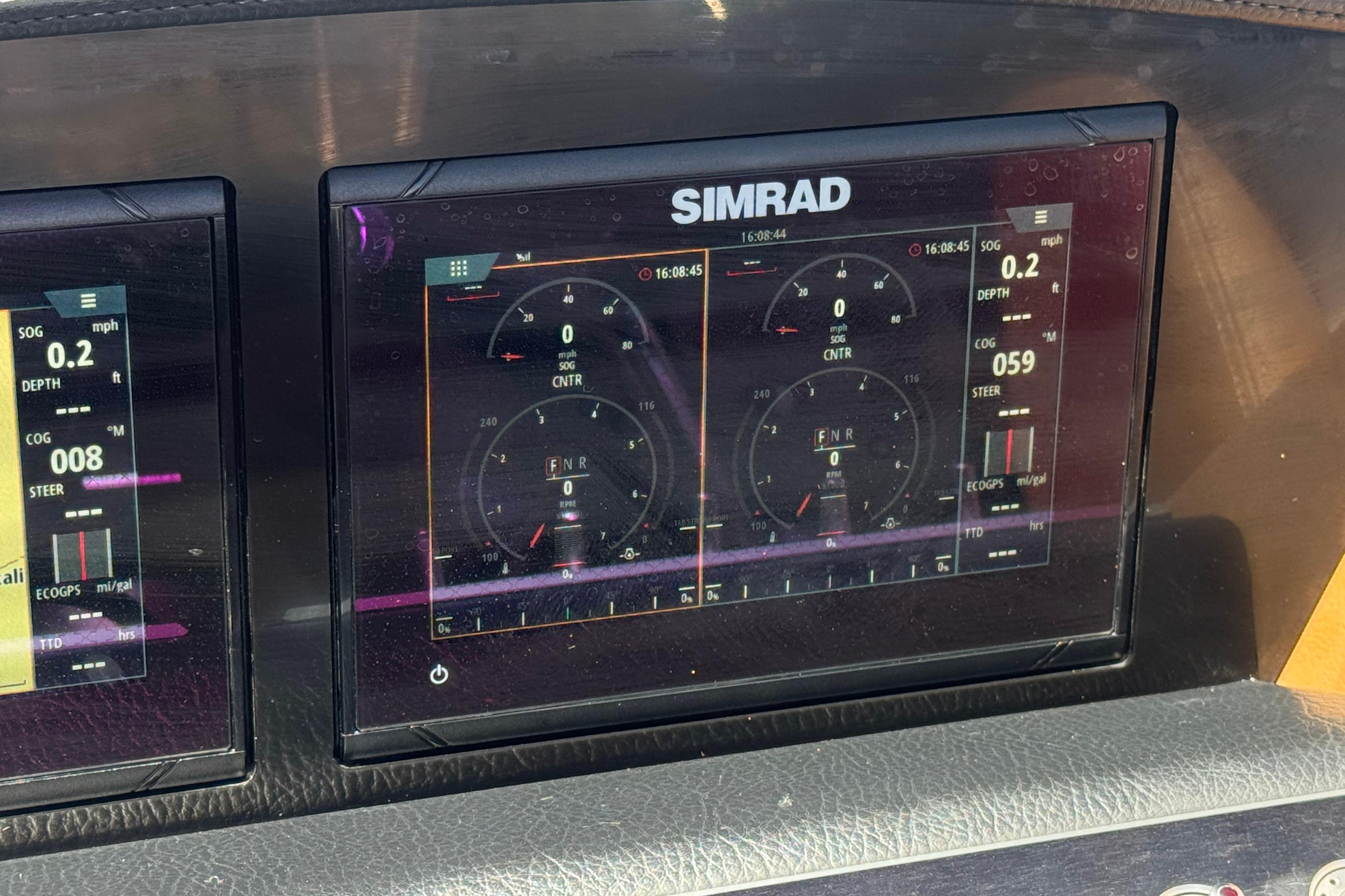 Simrad display on 2022 Four Winns H4 boat dashboard showing navigation data.
