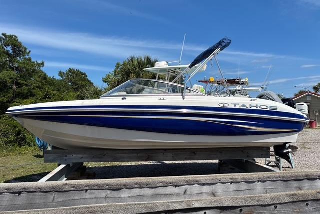2012 Tahoe Q8 SSi boat with blue and white design on a trailer.