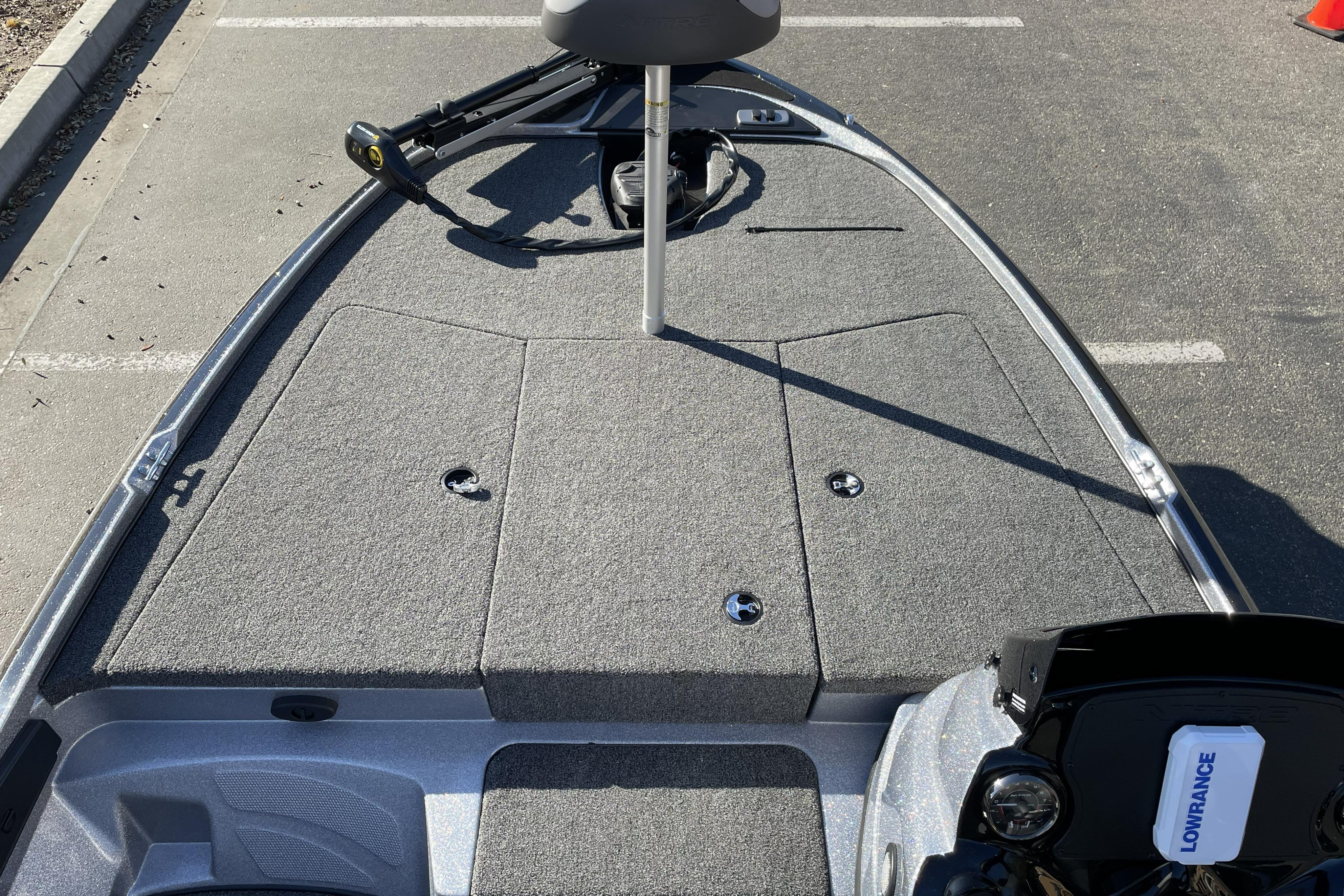 2026 Nitro Z17 boat deck with carpeted surface and fishing seat.