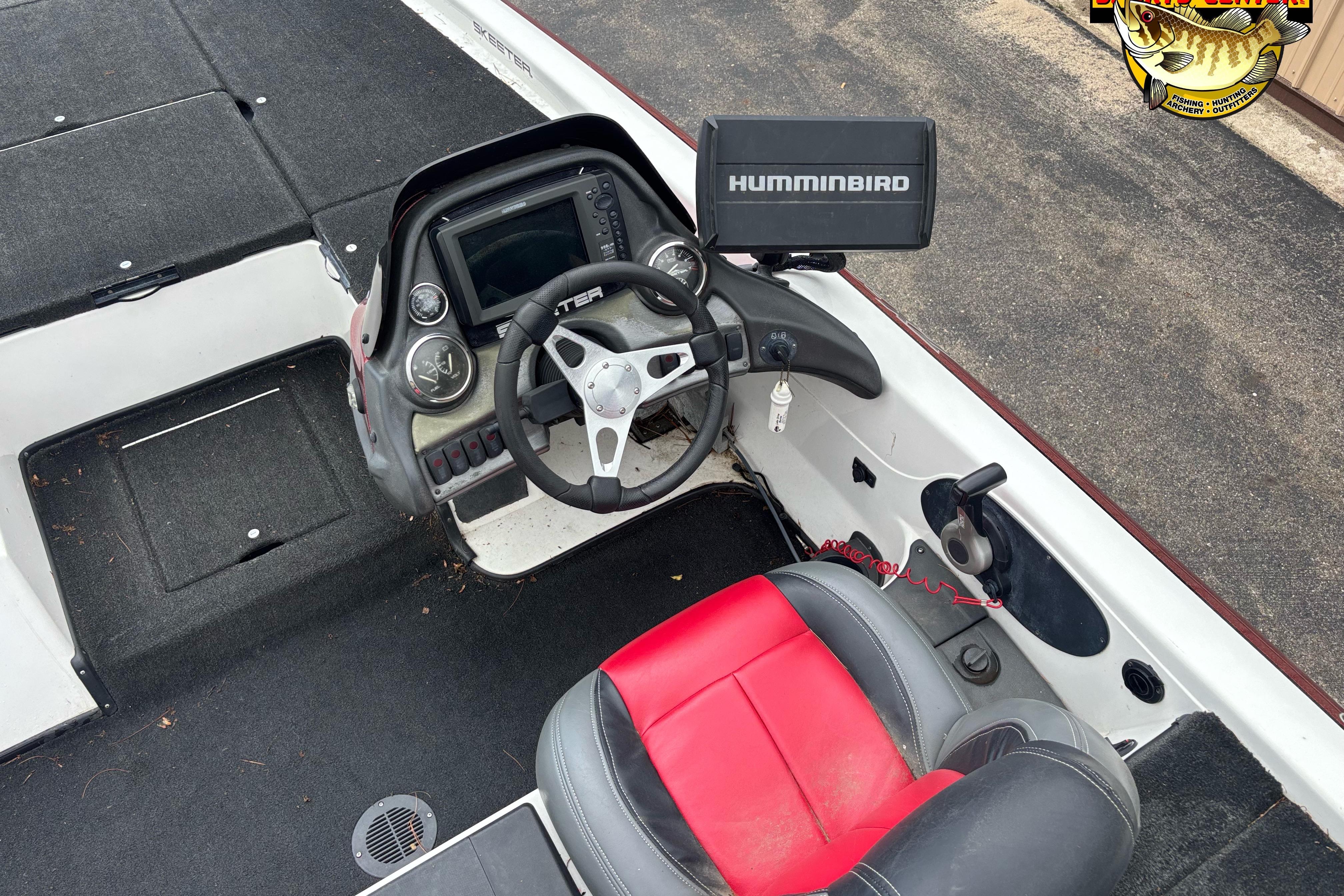 2013 Skeeter ZX20 boat cockpit with Humminbird electronics and red-black seating.