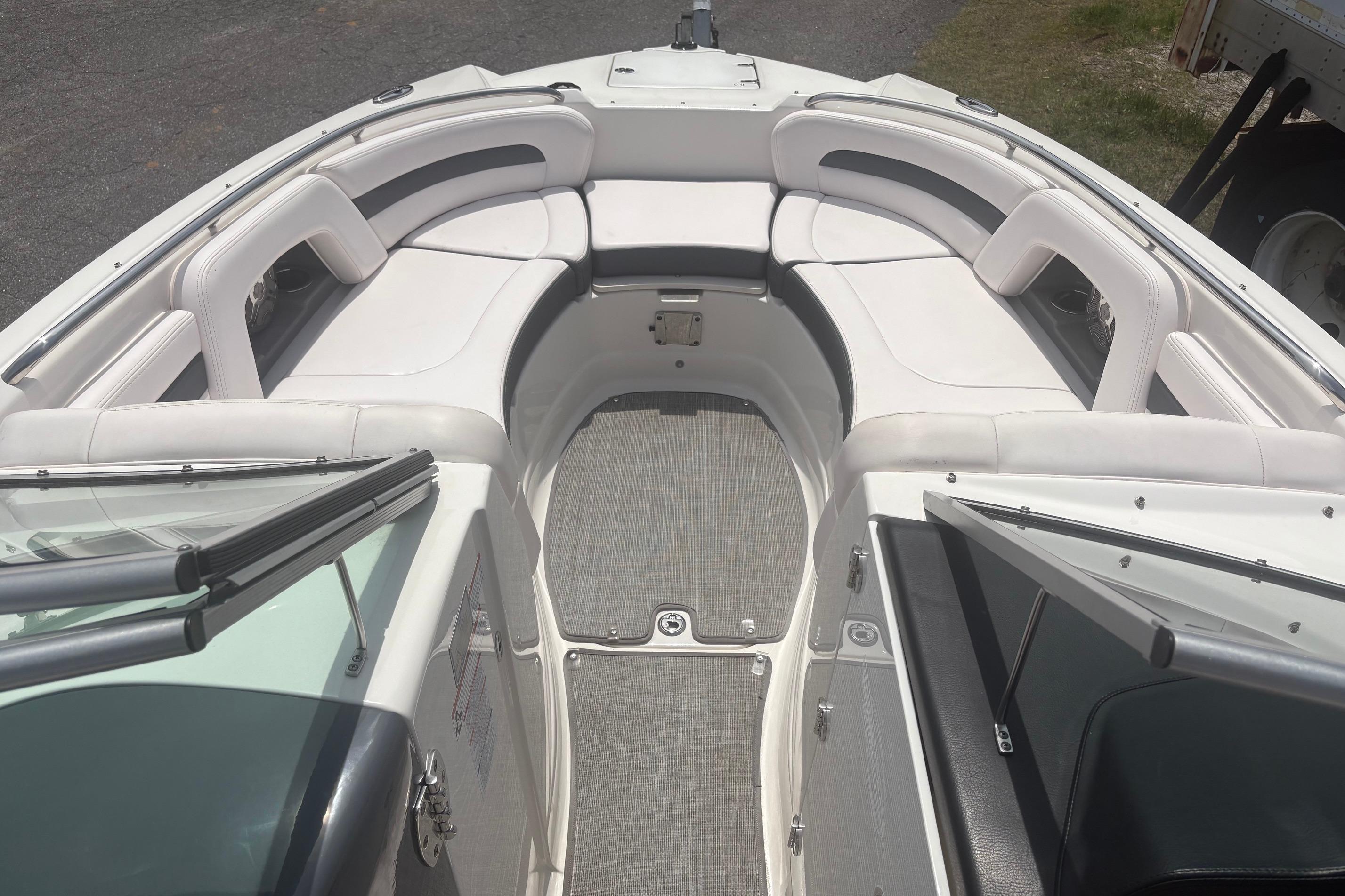 2019 Chaparral 264 Sunesta boat interior with spacious seating and sleek design.