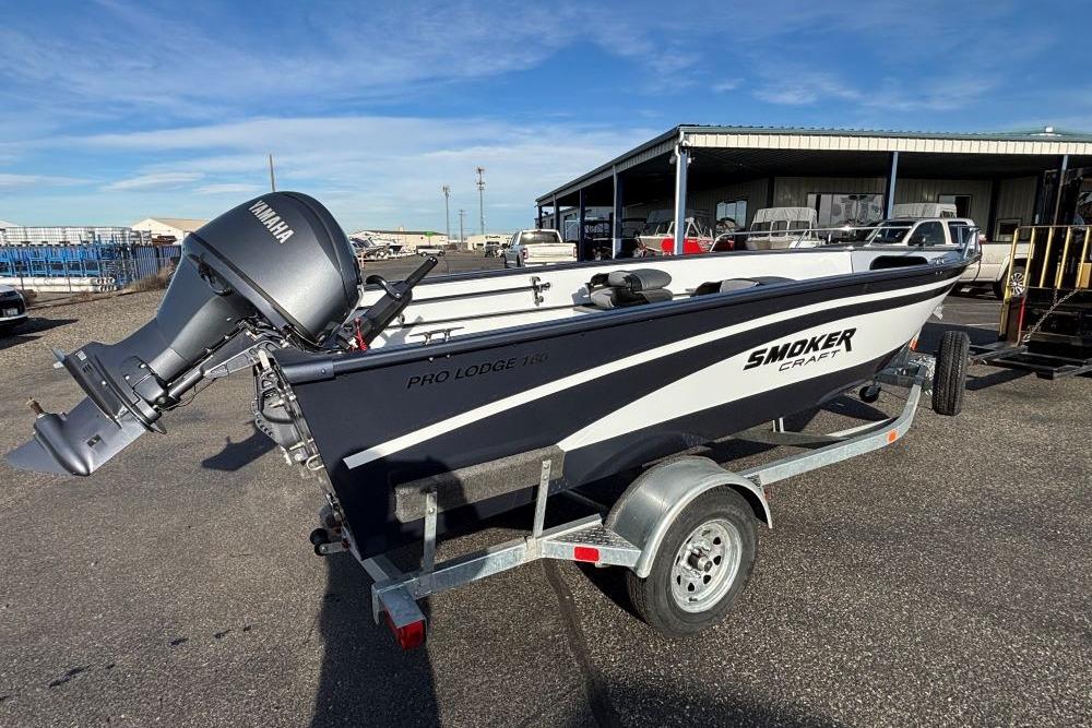 2026 Smoker Craft Pro Lodge 160 boat on trailer with Yamaha motor.