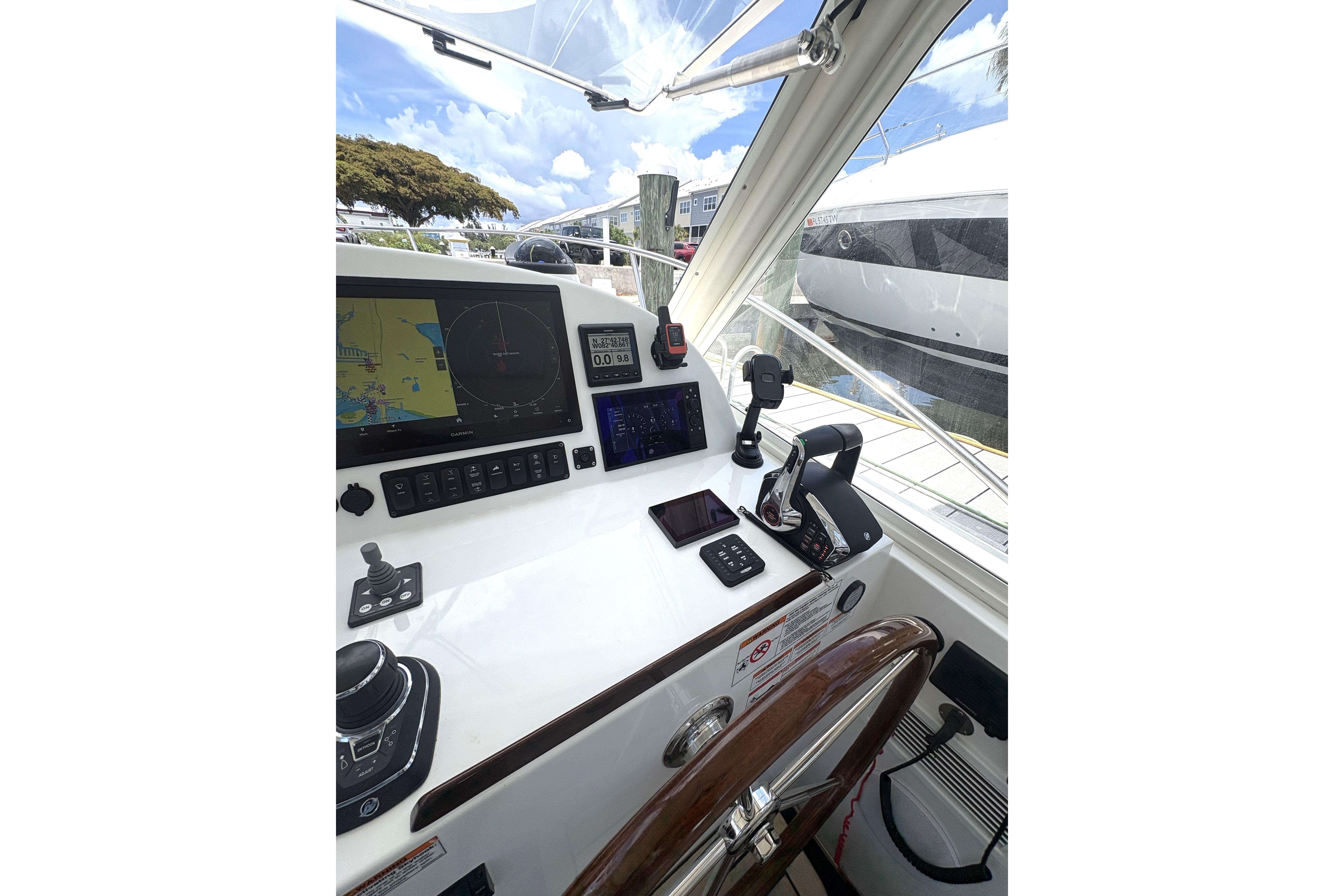 Helm of 2024 MJM 35z boat featuring advanced navigation and control systems.