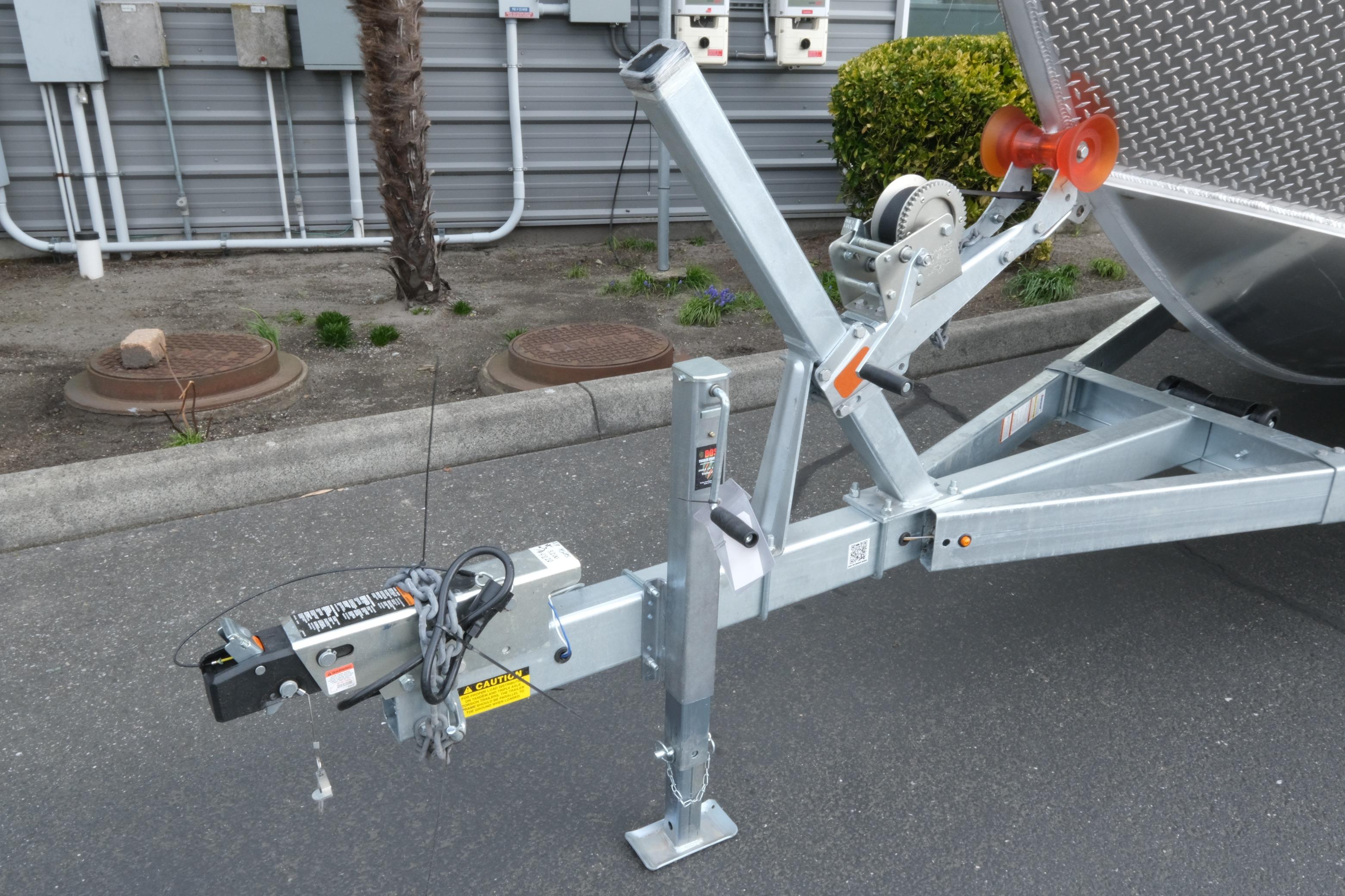 Trailer hitch of 2026 Hewescraft 210 Sea Runner ET Hardtop, parked on asphalt.
