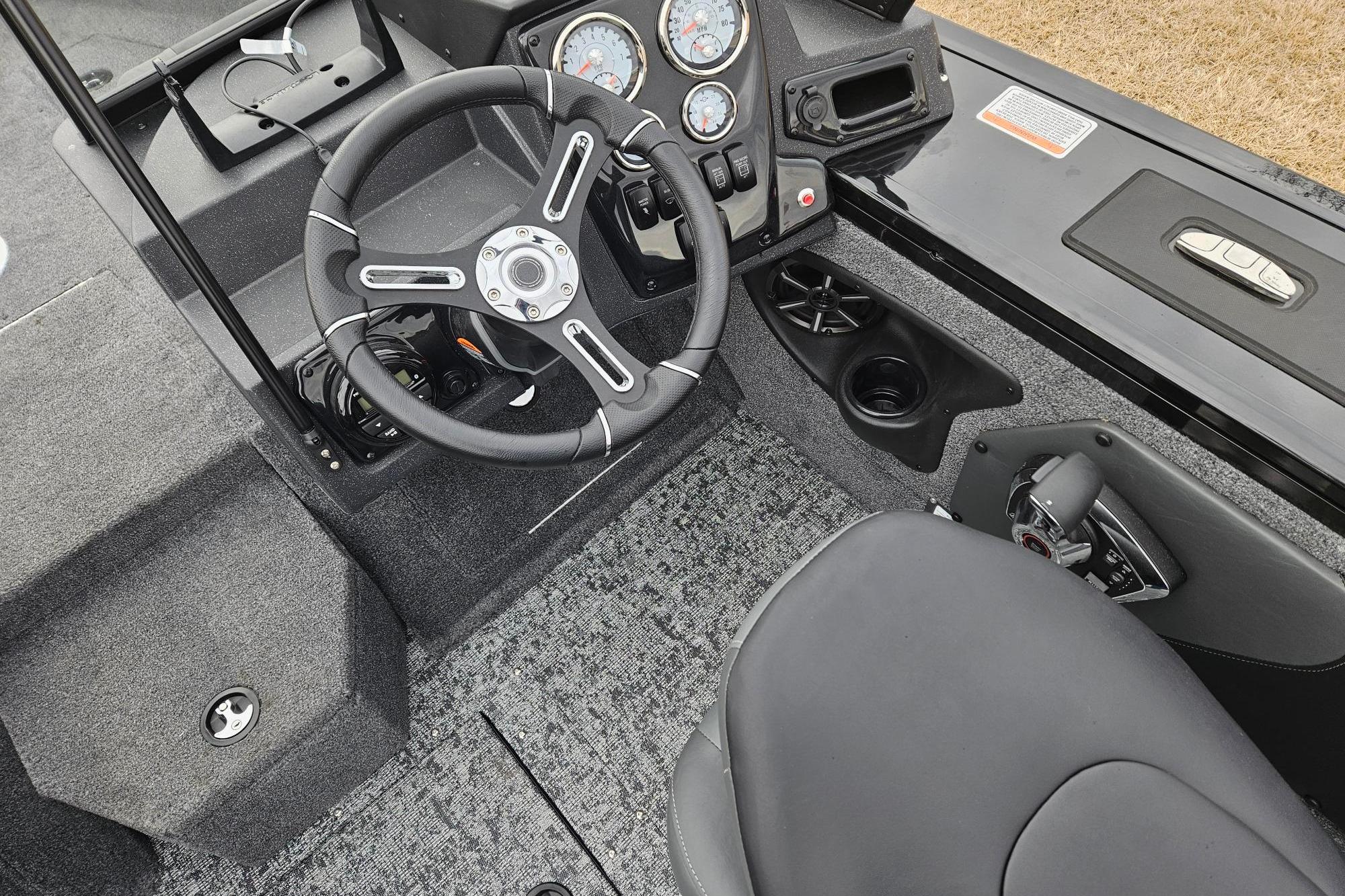 2026 Tracker Targa V-19 WT boat interior with steering wheel and control panel.